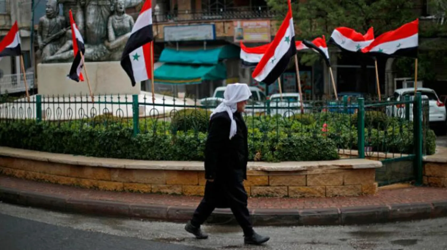 İşgal altındaki Golan'da bulunan Mecdel Şems köyündeki Suriye bayrakları. (AFP)