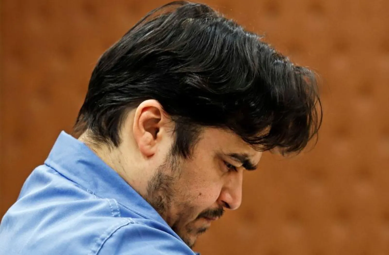 المعارض الإيراني روح الله زم (أ.ف.ب)