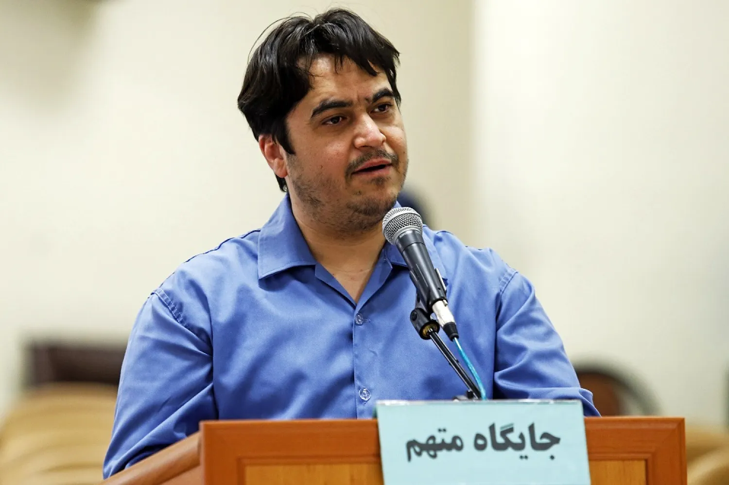In this file photo, journalist Ruhollah Zam speaks during his trial at the Revolutionary Court, in Tehran, Iran, on June 2, 2020. (AP)
