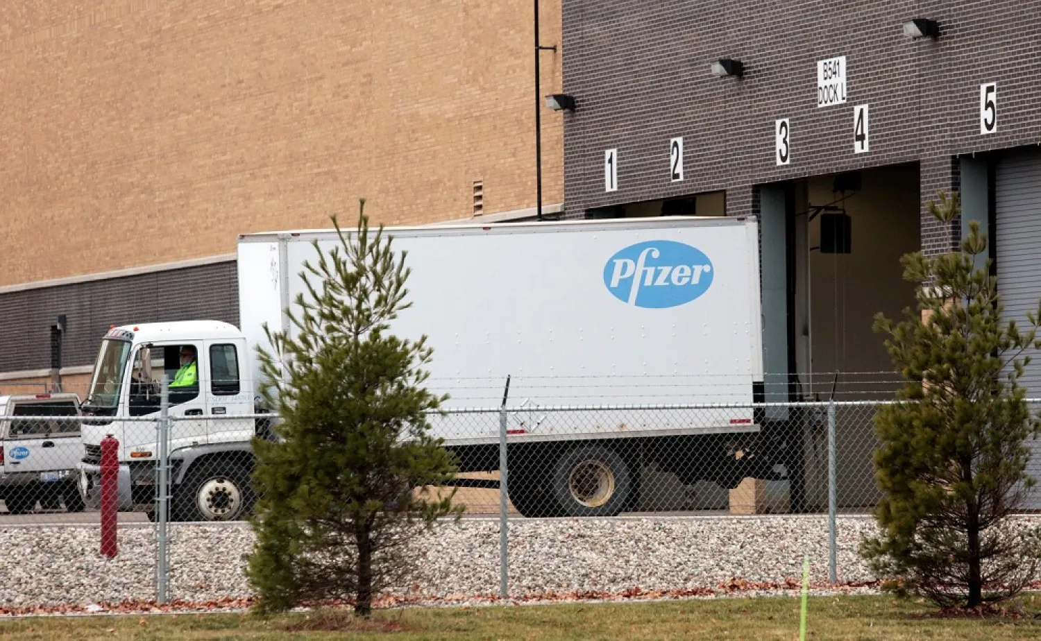 The first trucks carrying a COVID-19 vaccine for widespread use in the US were set to pull out of a Michigan manufacturing plant Sunday. (Reuters)