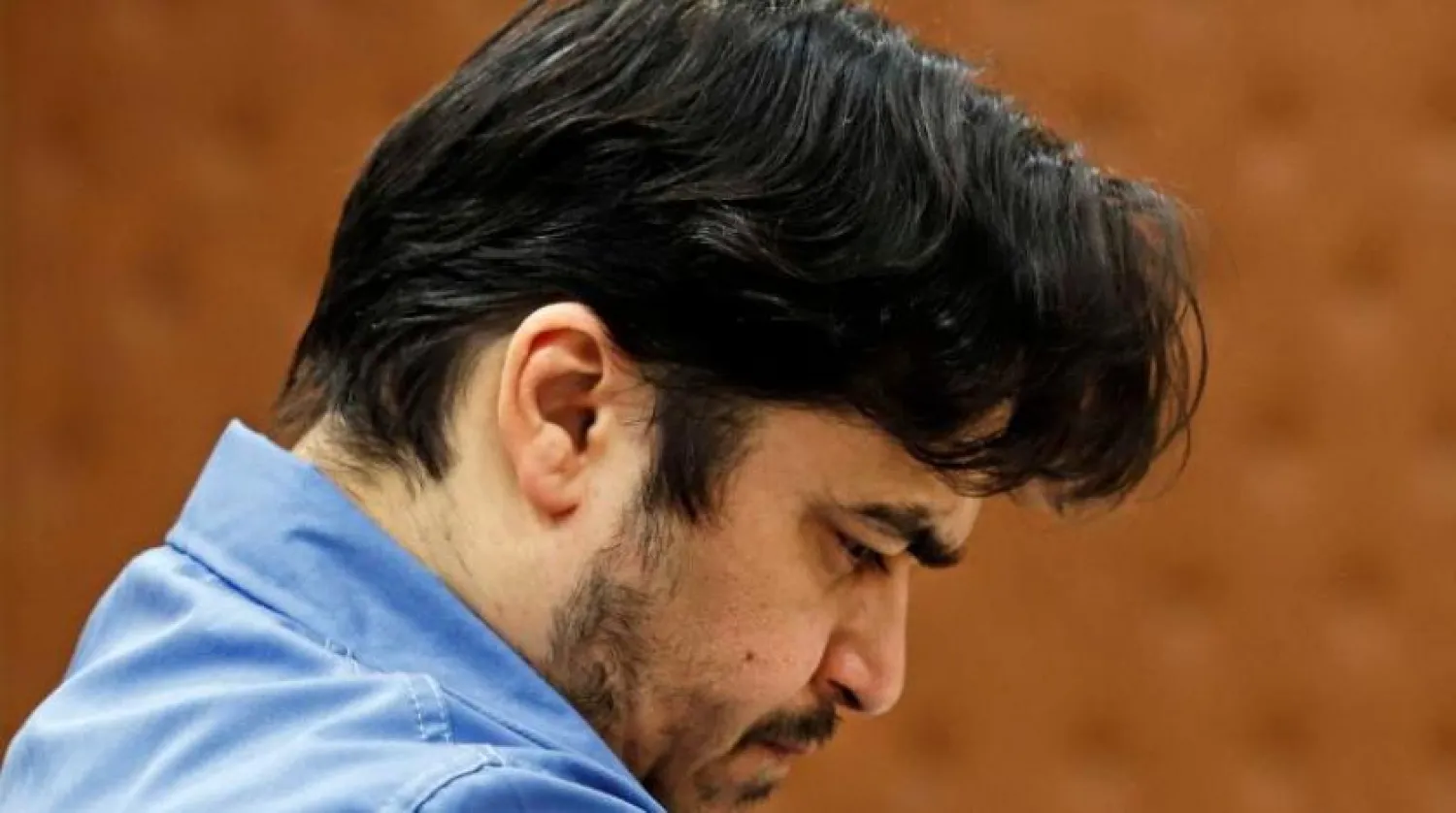 المعارض الإيراني روح الله زم (أ.ف.ب)