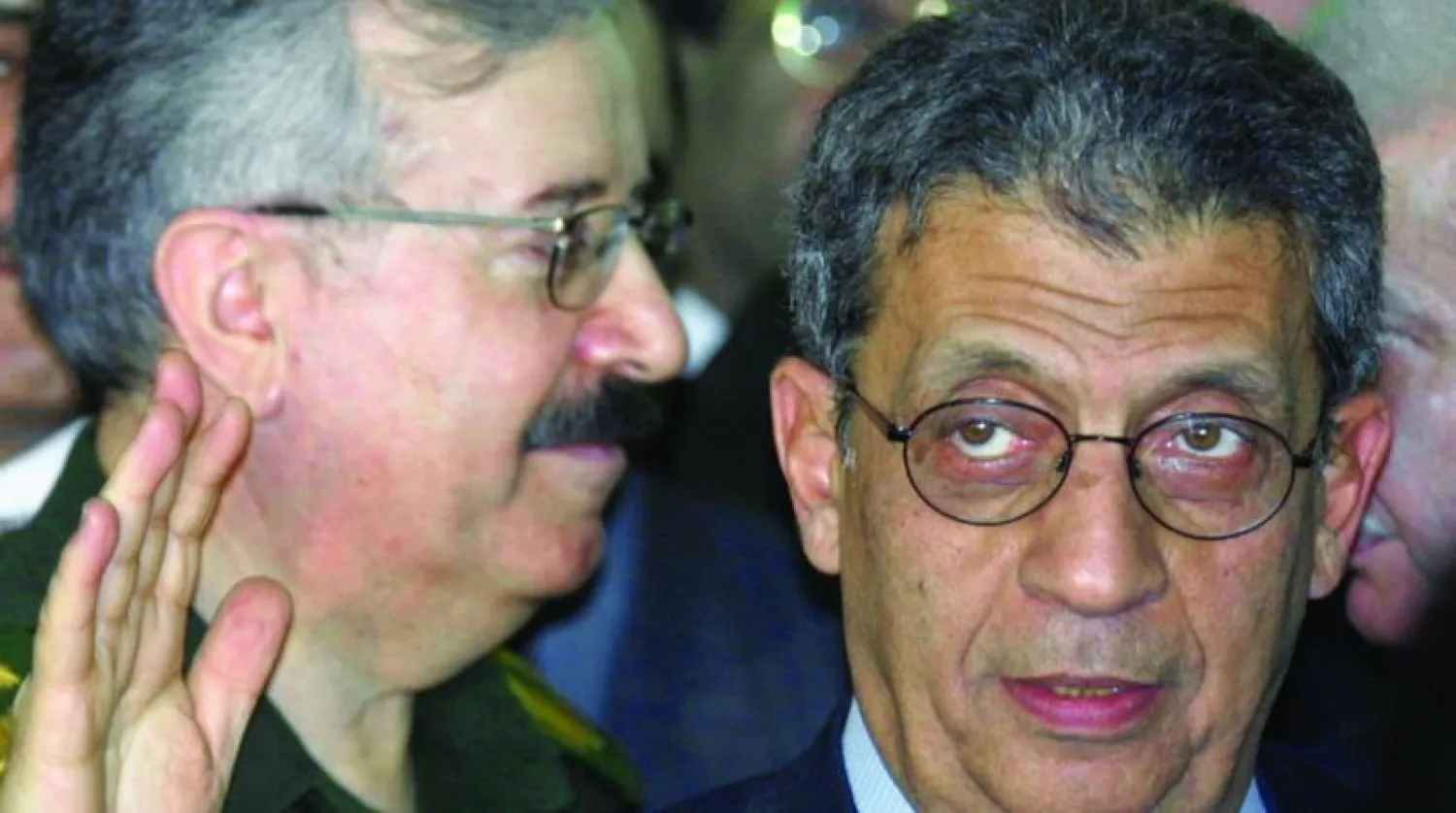 Former Secretary-General of the Arab League, Amr Moussa and former Iraqi Foreign Minister Naji Sabri Al-Hadithi in Baghdad, 2002 - Getty Images