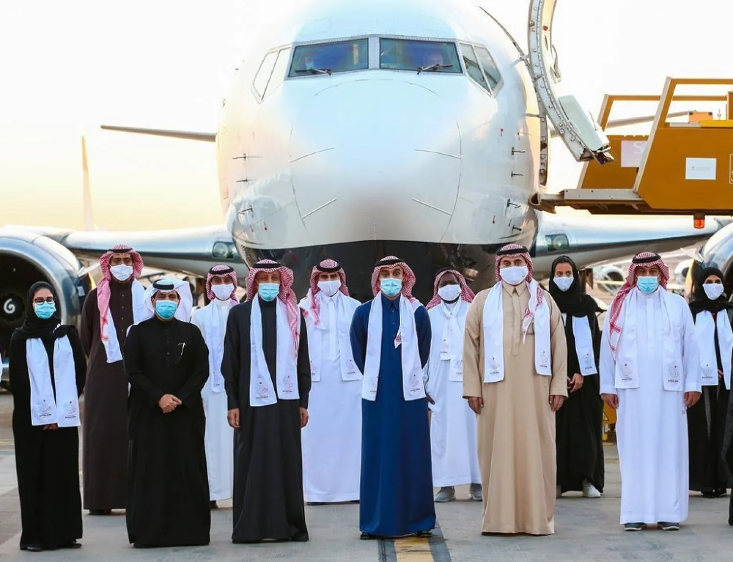The Saudi delegation promoting Riyadh's hosting of the Asian Games poses for a photo upon its arrival in Muscat earlier this week. (SPA)