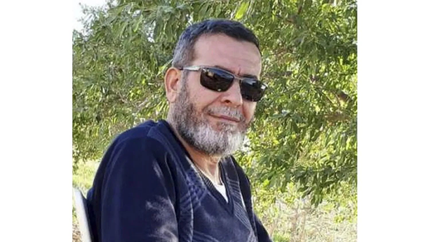 This undated photo provided by his son Kenan Aljasem shows Dr. Adnan Jasem in Albad, Syria. Jasem had every reason to leave war-torn Syria after surviving a bomb blast that broke his legs four years earlier and receiving job offers from abroad. Still, Jasem stayed, committed to treating the people in his homeland. It was no surprise that he would be on the front lines when the first coronavirus cases appeared in northwest Syria this summer. By Sept. 6, 2020, Jasem started feeling ill. Four days later, the 58-year-old was dead. (Kenan Aljasem via AP)