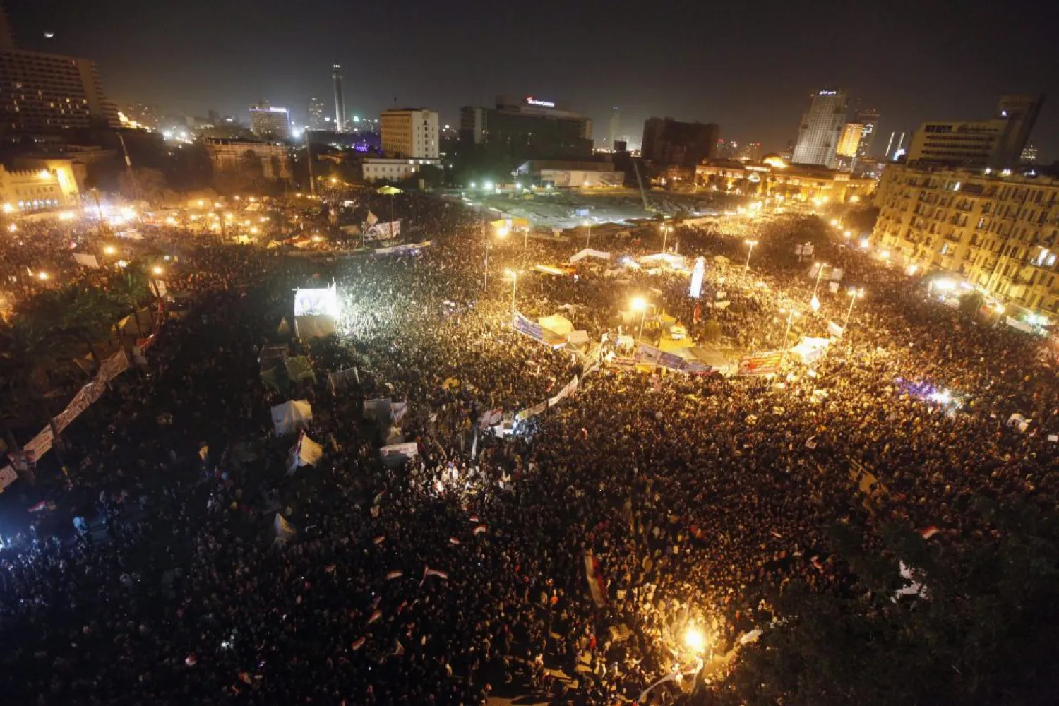 Demonstrators take part in a protest marking the first anniversary of Egypt's uprising at Tahrir Square in Cairo, January 25, 2012 | REUTERS