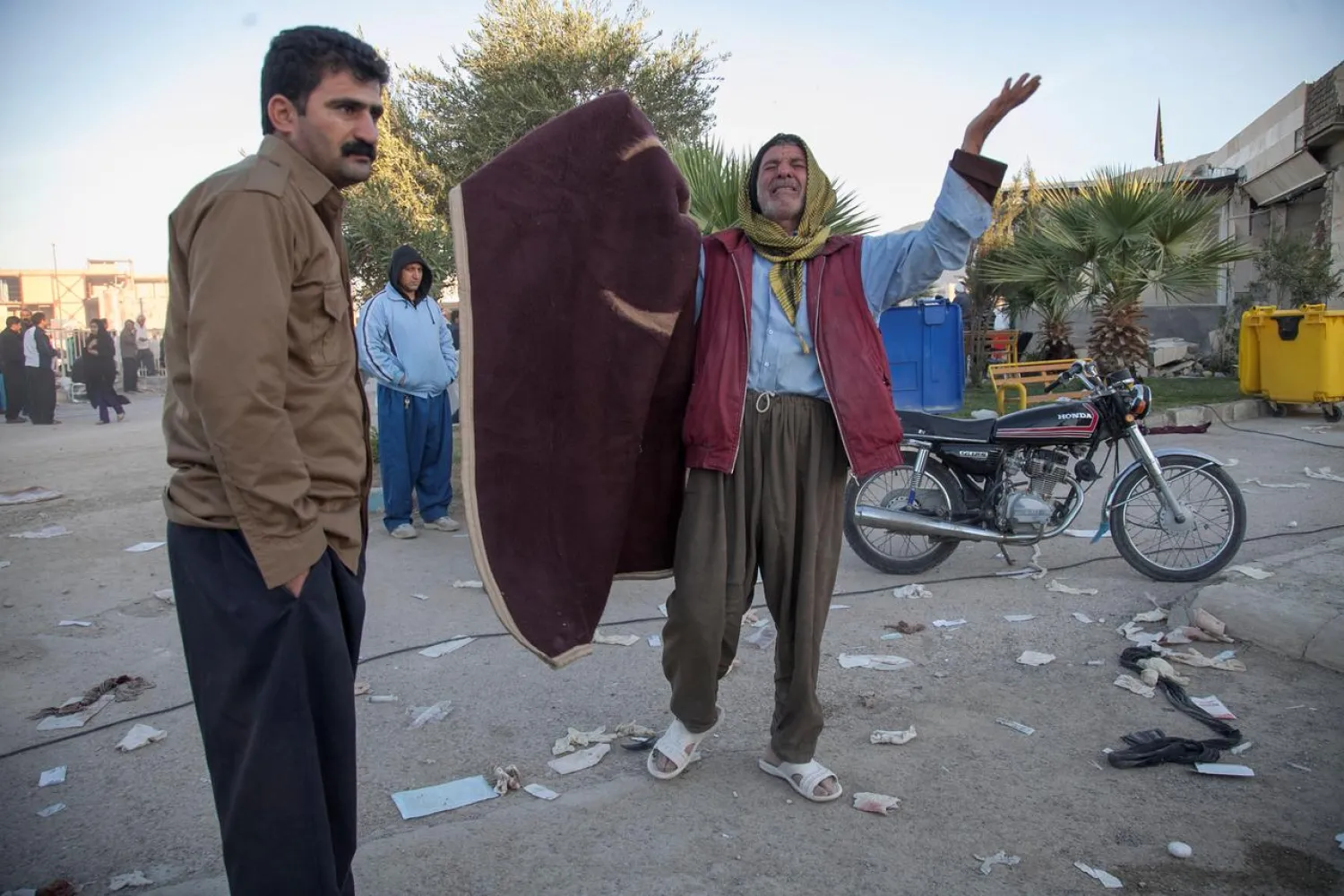 File photo: A man reacts following an earthquake in Sarpol-e Zahab county in Kermanshah, Iran. REUTERS/Tasnim News Agency