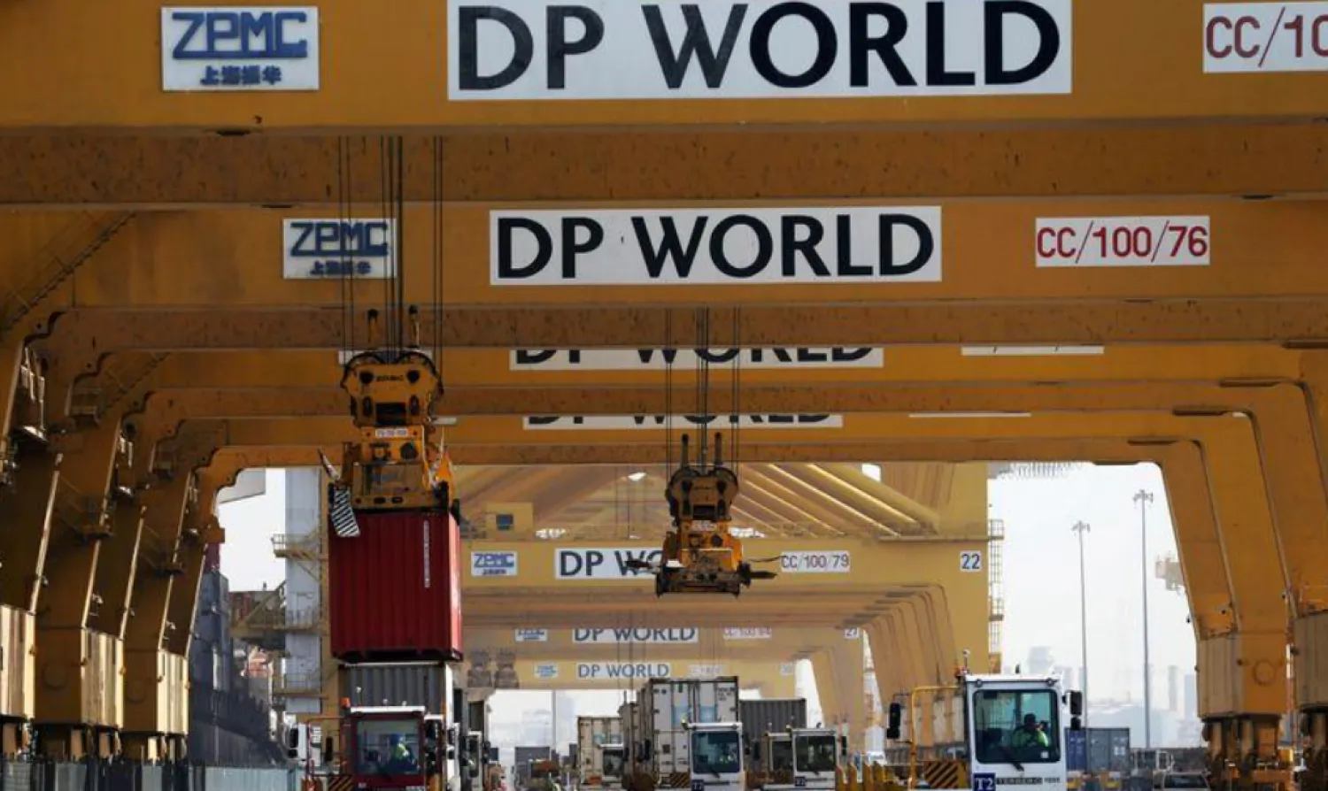 FILE PHOTO: Terminal tractors line up to load containers into a cargo ship at DP World's fully automated Terminal 2 at Jebel Ali Port in Dubai, United Arab Emirates, December 27, 2018. REUTERS/ Hamad I Mohammed/File Photo