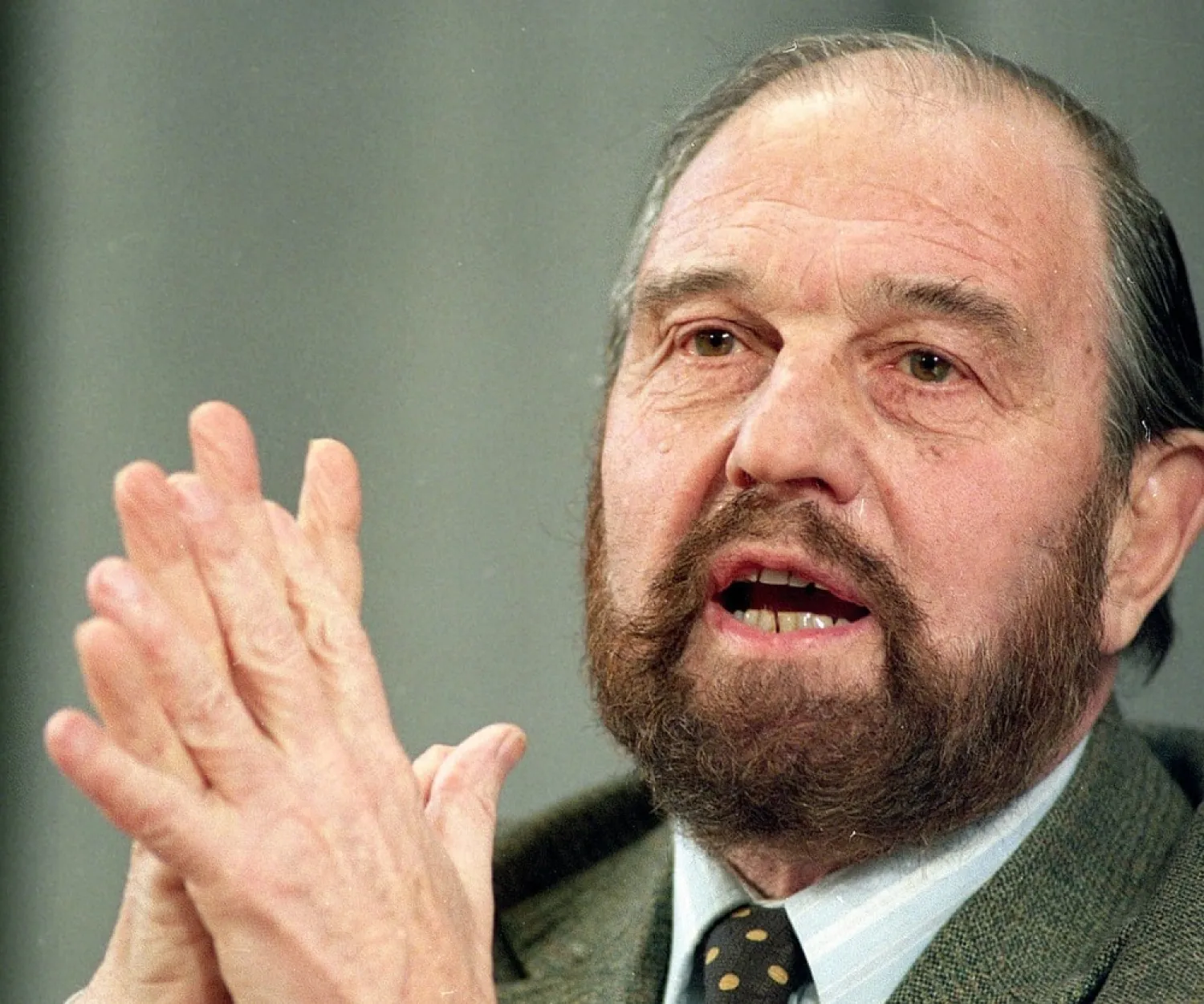 In this Jan. 15, 1992 file photo, George Blake, a former British spy who doubled as a Soviet agent, gestures during a news conference in Moscow. (AP)