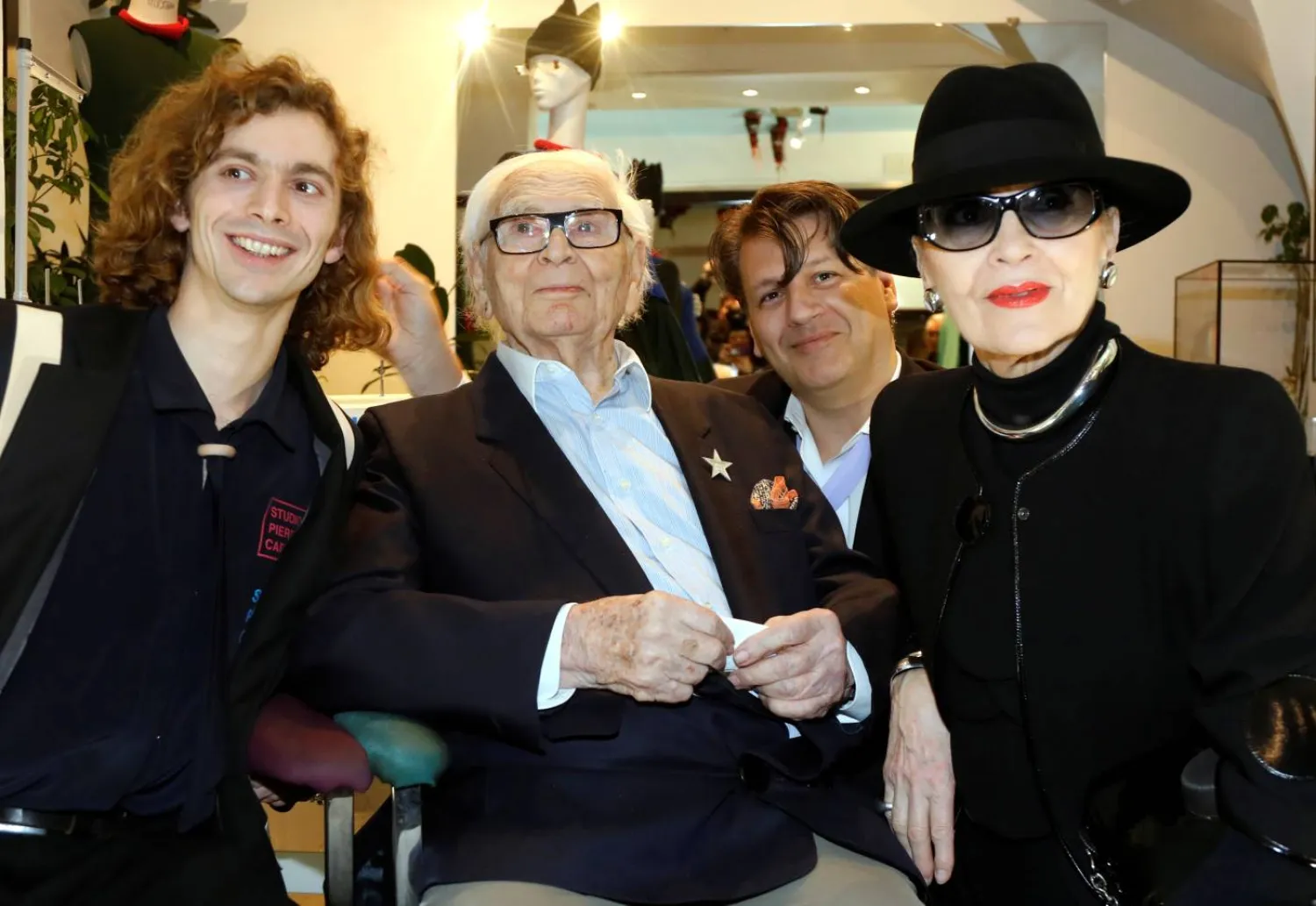 French fashion designer Pierre Cardin, 97, poses with designer Pierre Courtial, his nephew Rodrigo Basilicati and former modele Maryse Gaspard during a presentation at his Studio Pierre Cardin in Paris, France, February 27, 2020. REUTERS/Charles Platiau