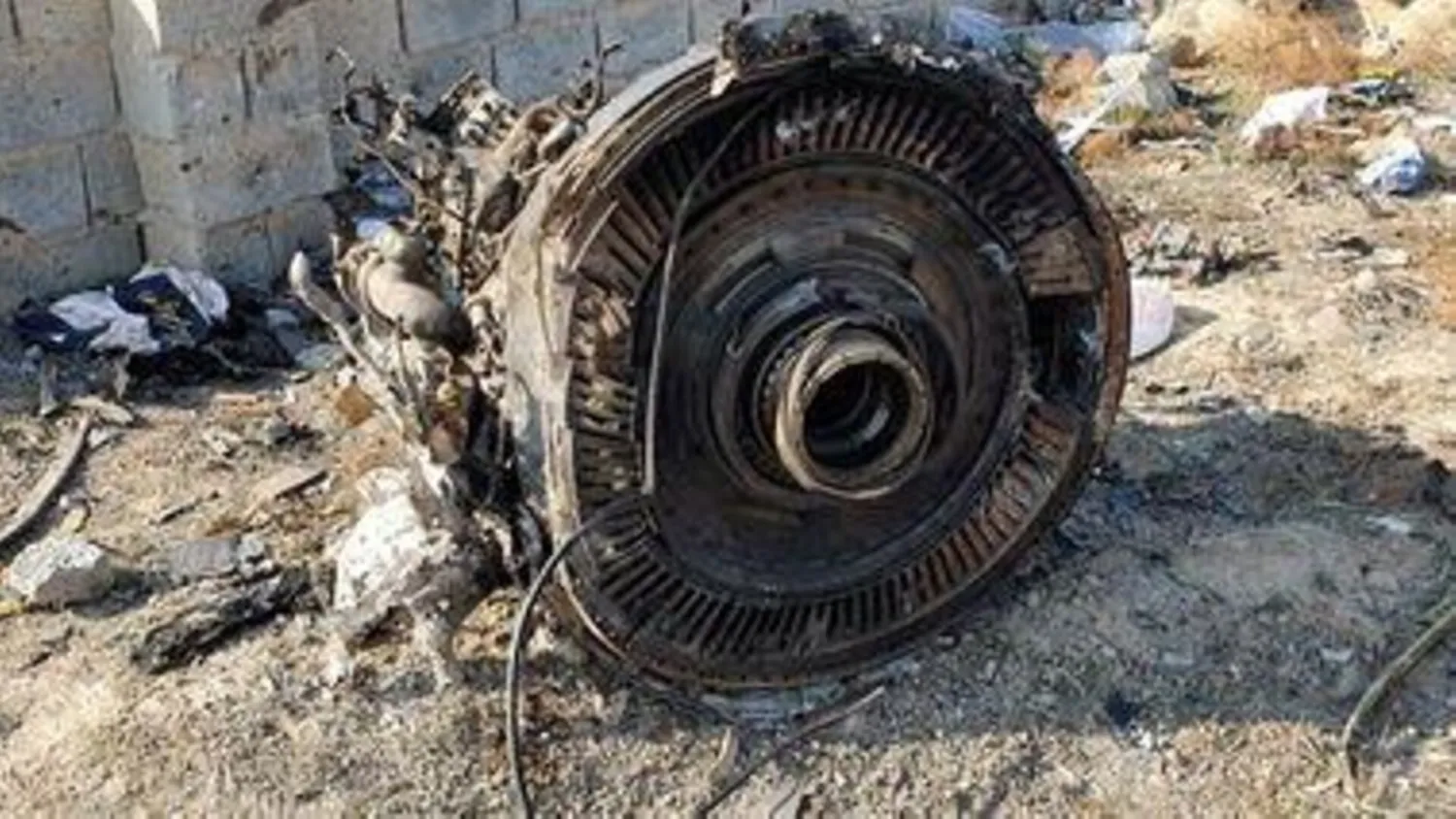 FILE PHOTO: General view of the debris of the Ukraine International Airlines, flight PS752, Boeing 737-800 plane that crashed after take-off from the outskirts of Tehran, Iran January 8, 2020 is seen in this screen grab obtained from a social media video via REUTERS