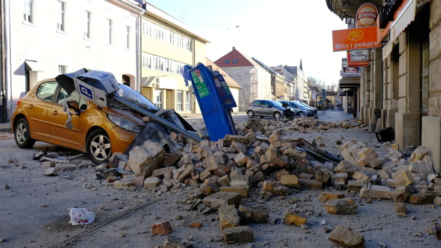 A destroyed car is seen on a street after an earthquake in Sisak, Croatia December 29, 2020. Slaven Branislav Babic/PIXSELL REUTERS 