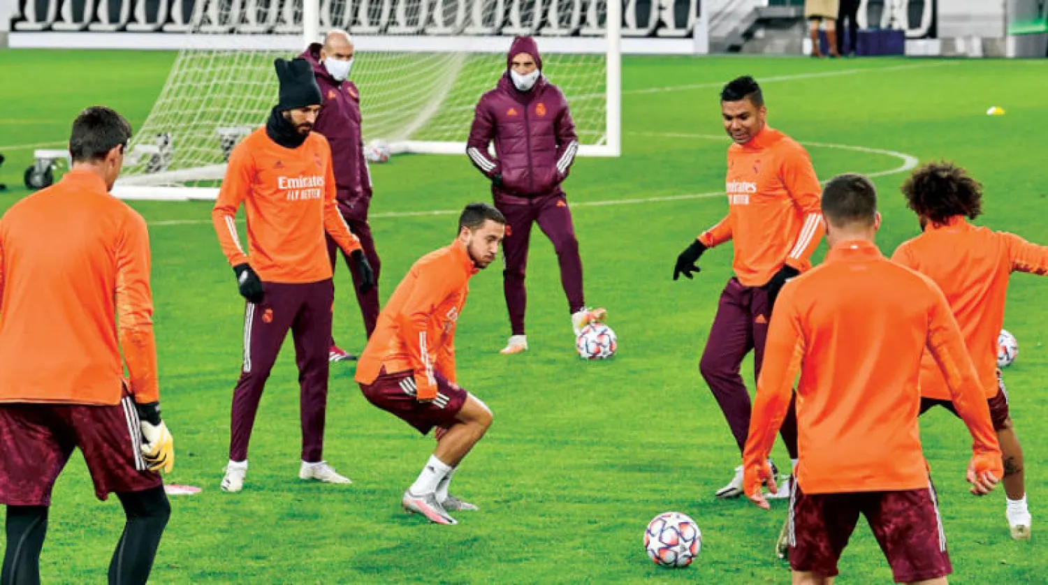 لاعبو ريال مدريد في التدريبات يتطلعون لبداية جيدة بالعام الجديد (أ.ب)