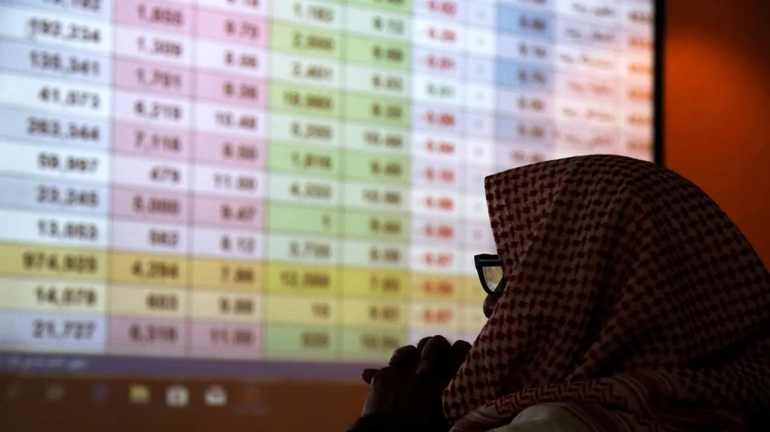 A Saudi trader monitors stocks at the Saudi stock market in Riyadh. (Reuters)