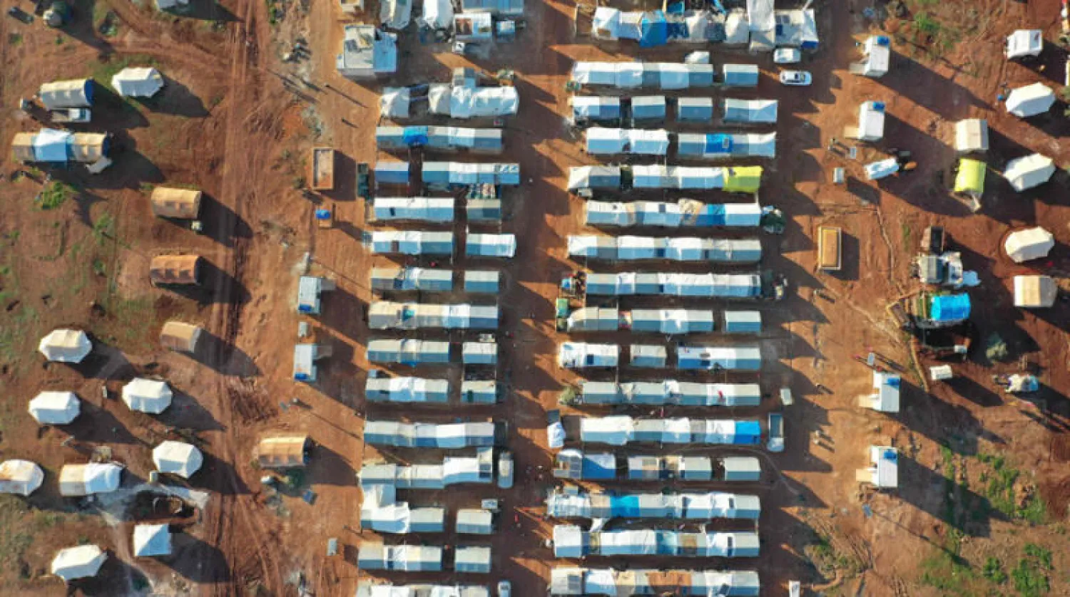 منظر من الجو لمخيم للنازحين السوريين في معرة مصرين بمحافظة إدلب يوم 26 ديسمبر الماضي (أ.ف.ب)