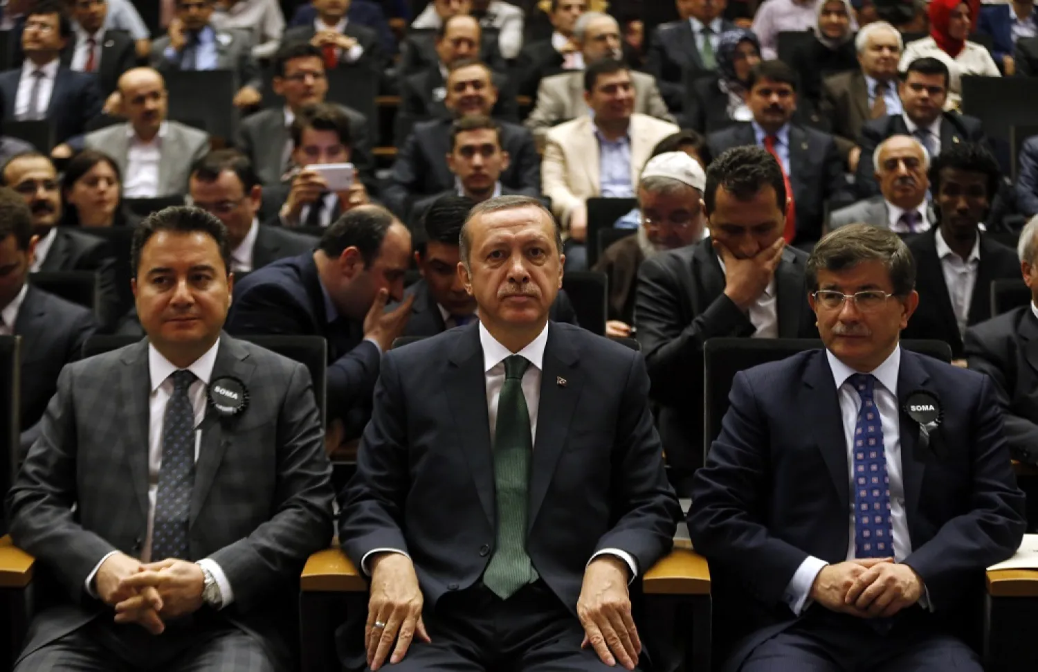 Recep Tayyip Erdogan (C), flanked by Ali Babacan (L) and Ahmet Davutoglu (R), in Ankara in 2014. (Reuters)