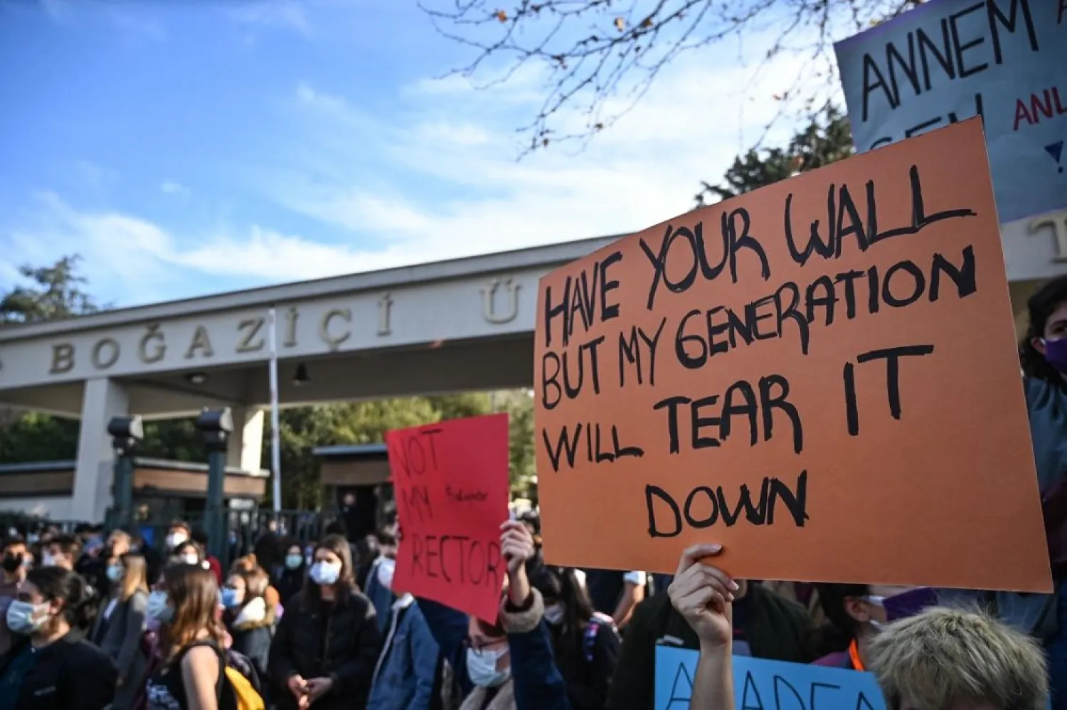 Students demonstrate against the direct appointment Bogazici university's new rector by Turkish president, on January 4, 2021 in front of the University in Istanbul. (AFP)