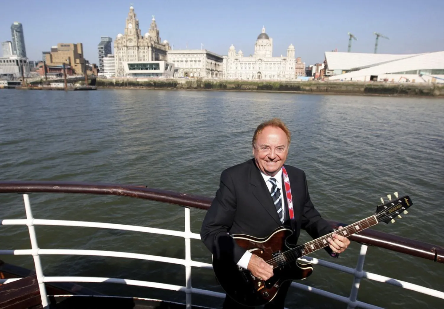 This April 20, 2009 file photo shows Gerry Marsden on board the Mersey ferry. (AP)