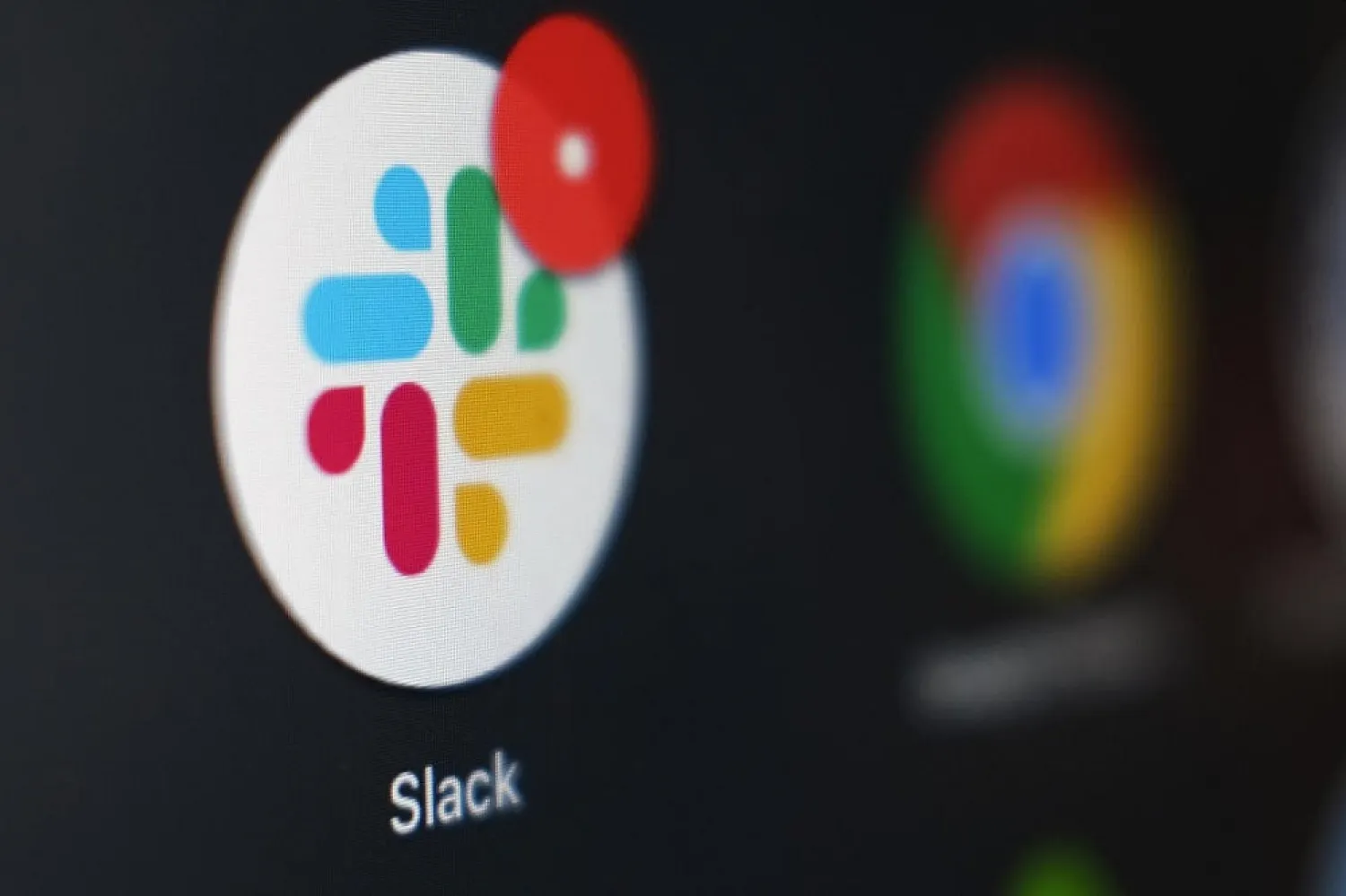 This Dec. 2, 2020, file photo shows the Slack app icon being displayed on a computer screen in Tokyo. (AP)