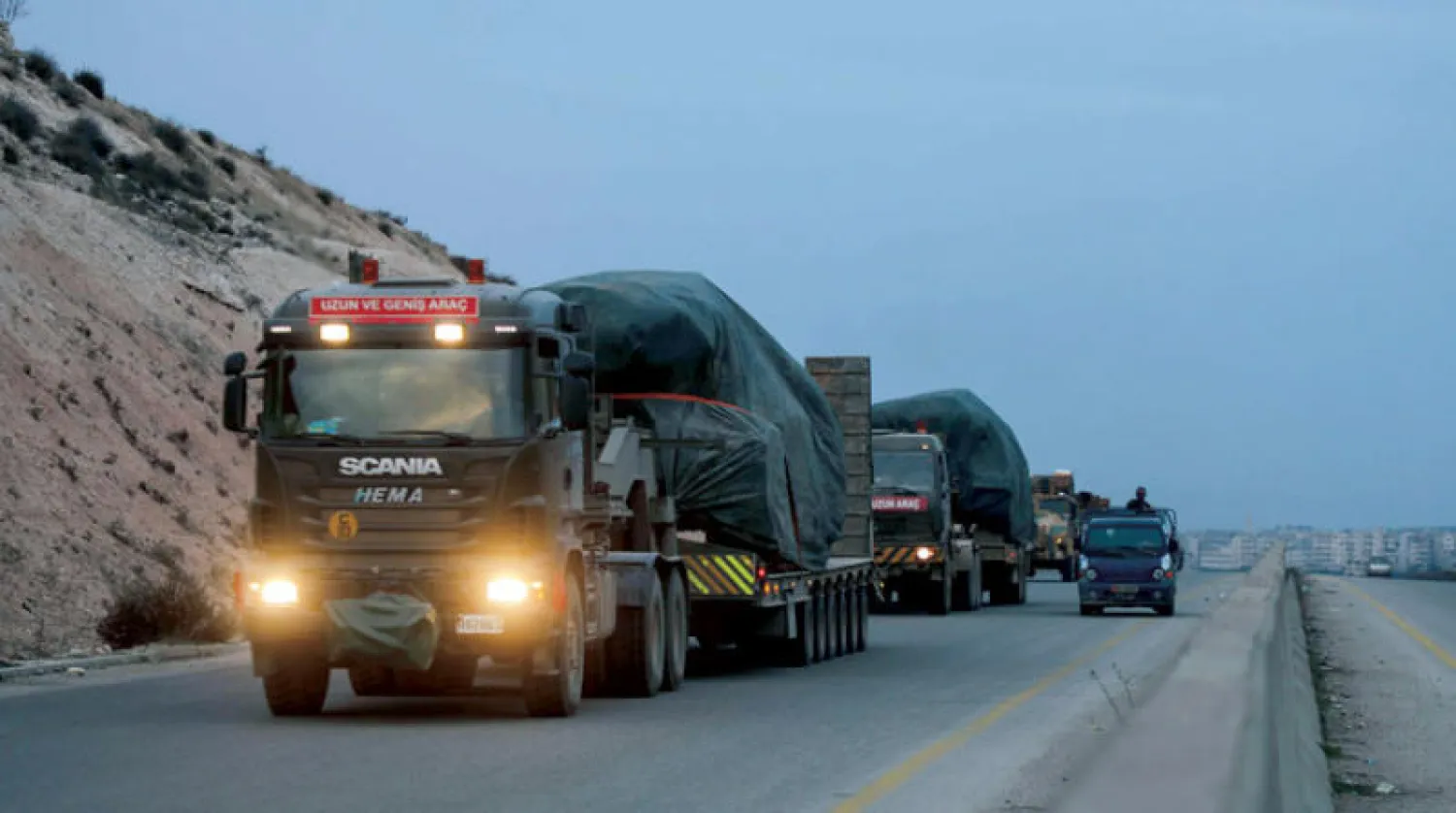 آليات للجيش التركي قرب أريحا بريف إدلب أول من أمس (أ.ف.ب)