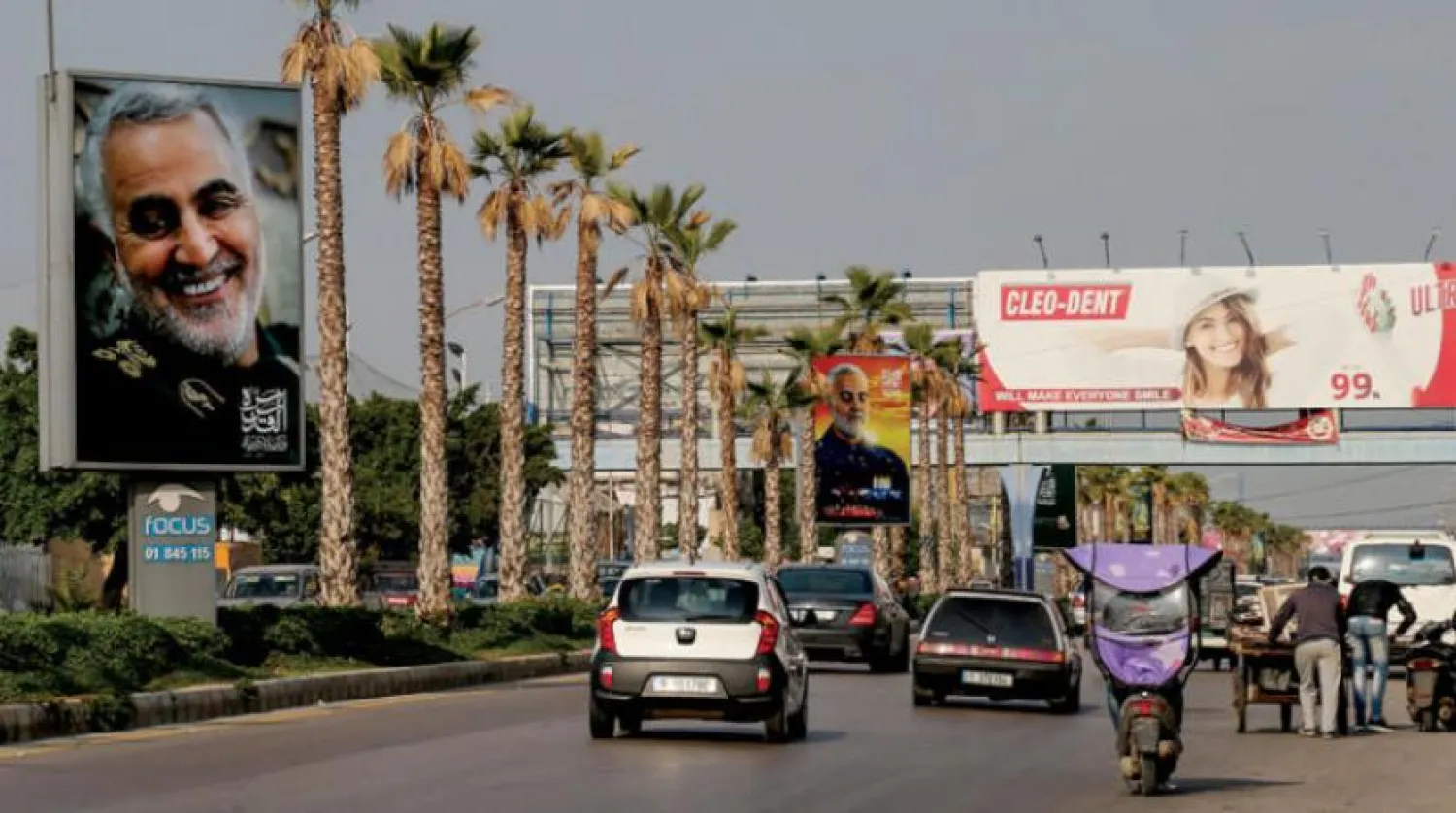Posters of the slain Iranian commander, Qassem Soleimani, are seen Beirut. Asharq Al-Awsat