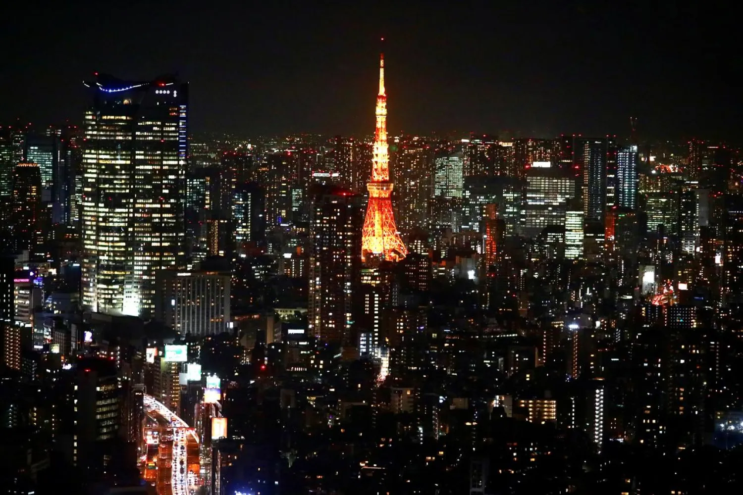 FILE PHOTO: A general view with Tokyo Tower is pictured in Tokyo, Japan March 12, 2020. REUTERS/Hannibal Hanschke