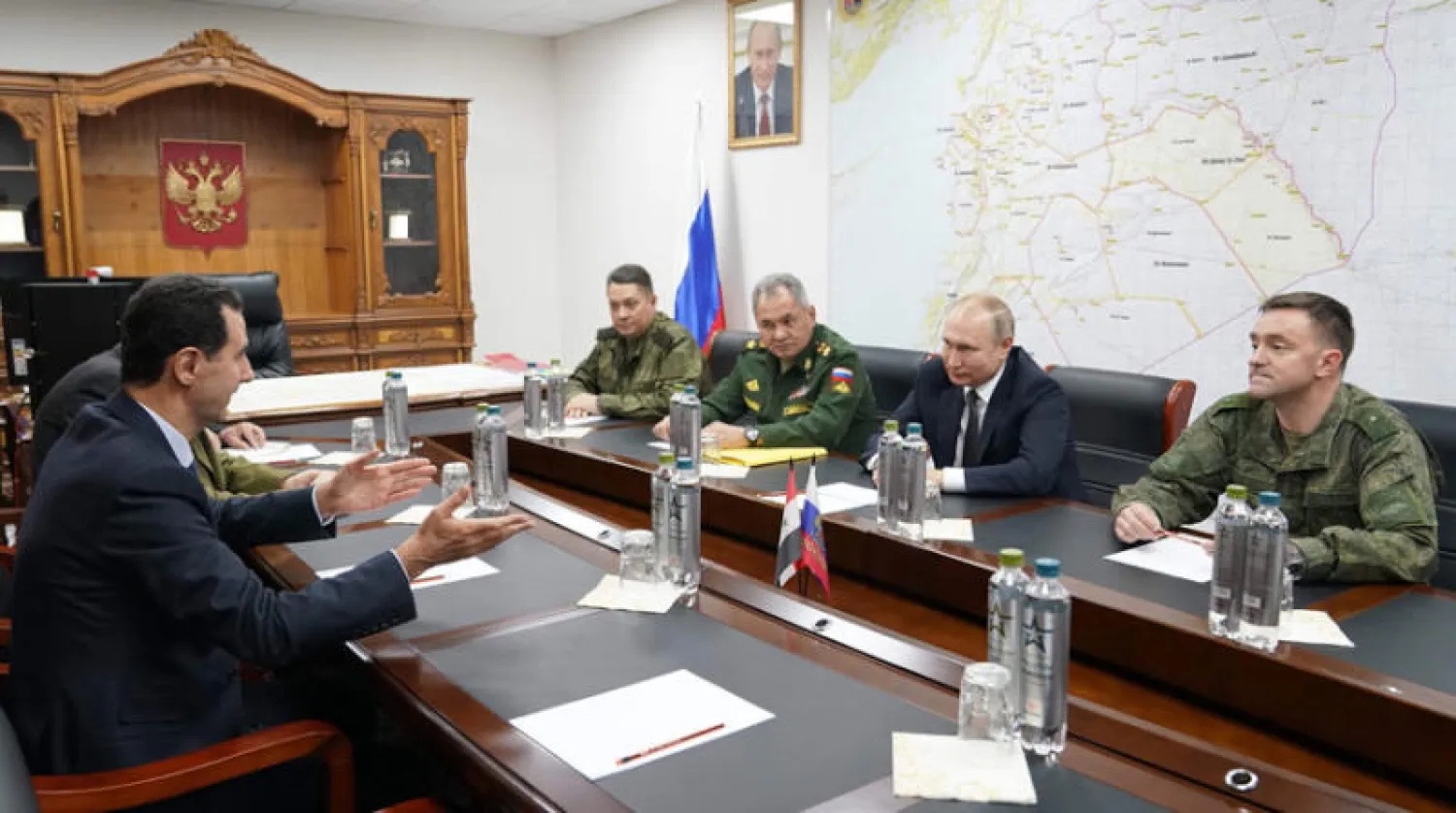 الرئيسان الروسي والسوري خلال محادثاتهما في مركز روسي بدمشق في 7 يناير 2020 (أ.ف.ب)