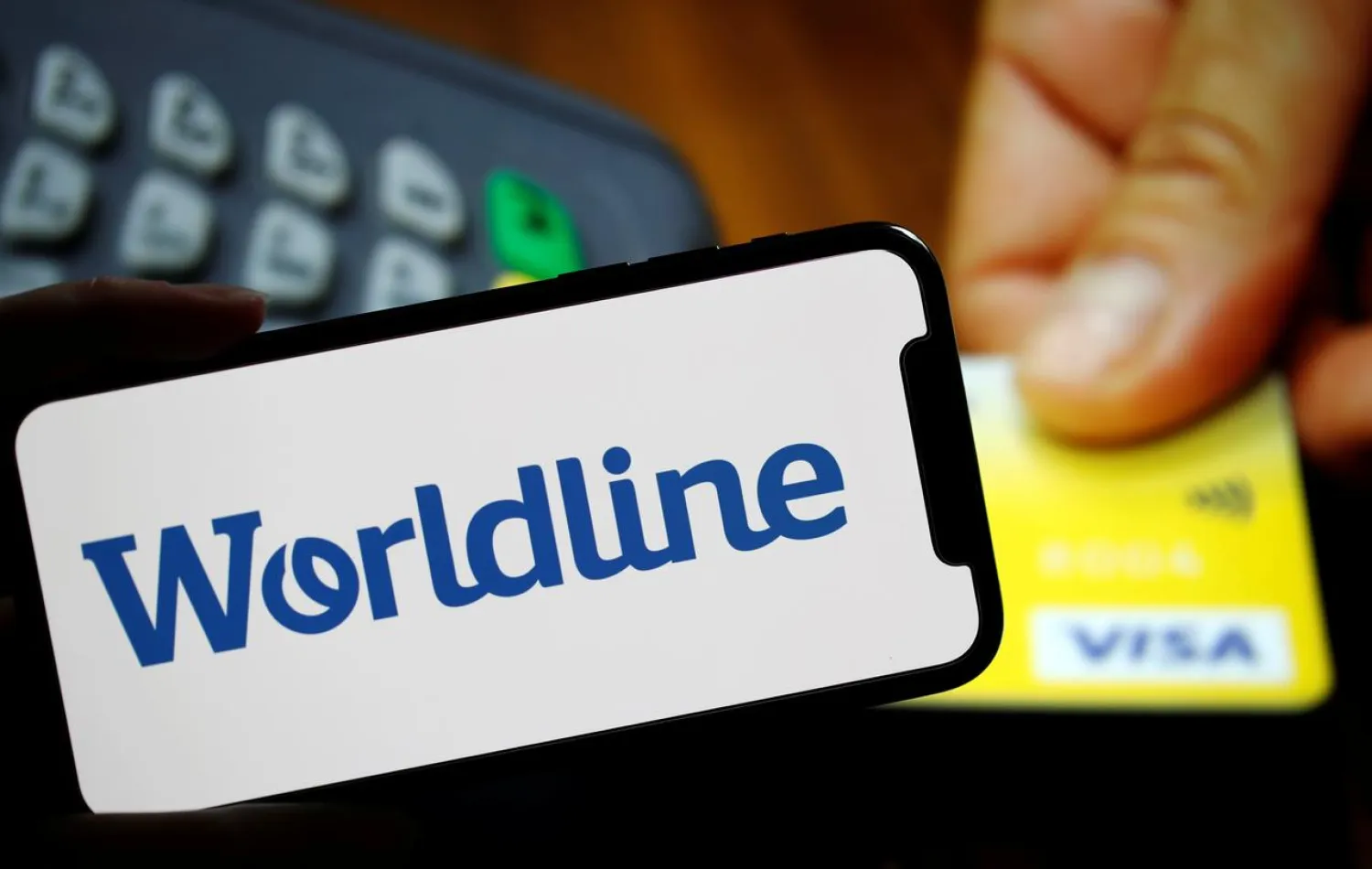 A logo of payments company Worldline is seen in the illustration picture taken February 3, 2020. REUTERS/Christian Hartmann/Illustratio