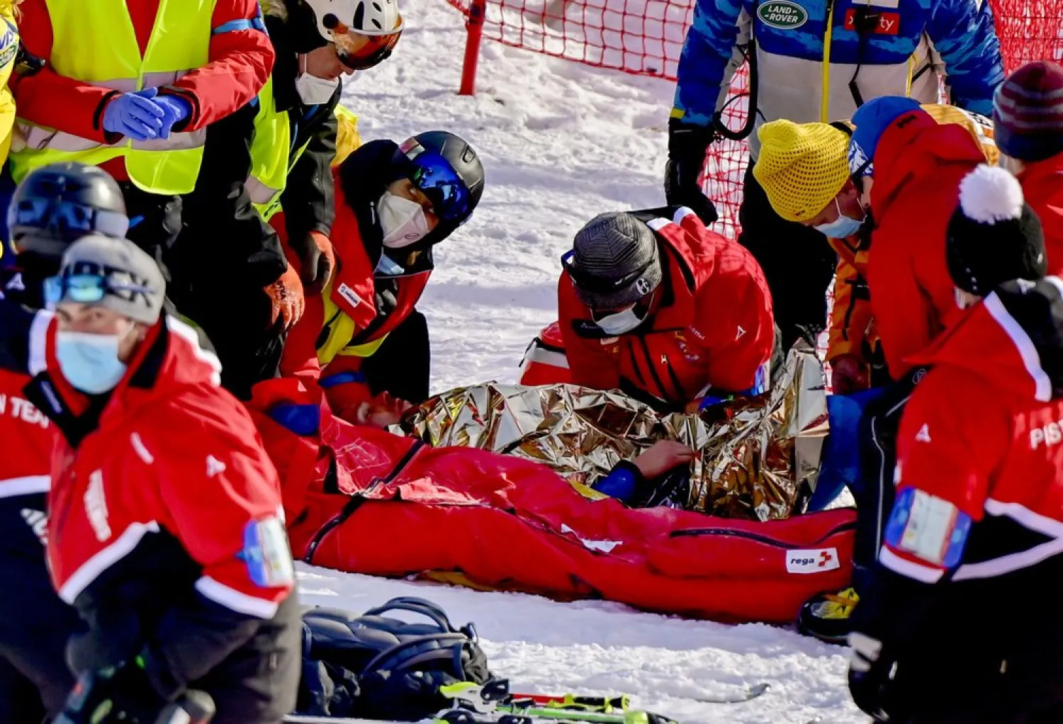 Injured Tommy Ford from the US during the first run of the men's giant slalom race at the FIS Alpine Skiing World Cup in Adelboden, Switzerland, Saturday, January 9, 2021. (Jean-Christophe Bott/Keystone via AP)
