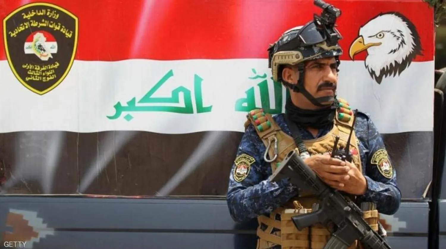 A member of the Iraqi federal police forces stands guard at a checkpoint in Baghdad's Karada district on May 20, 2019. (AFP)

