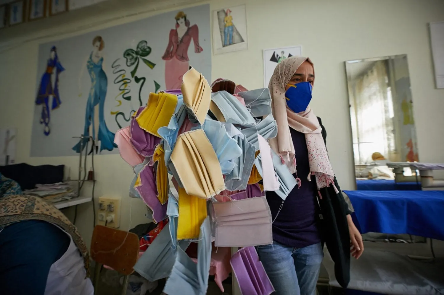 A sewing workshop makes single-use face masks in Algiers, March 2020. (Reuters)