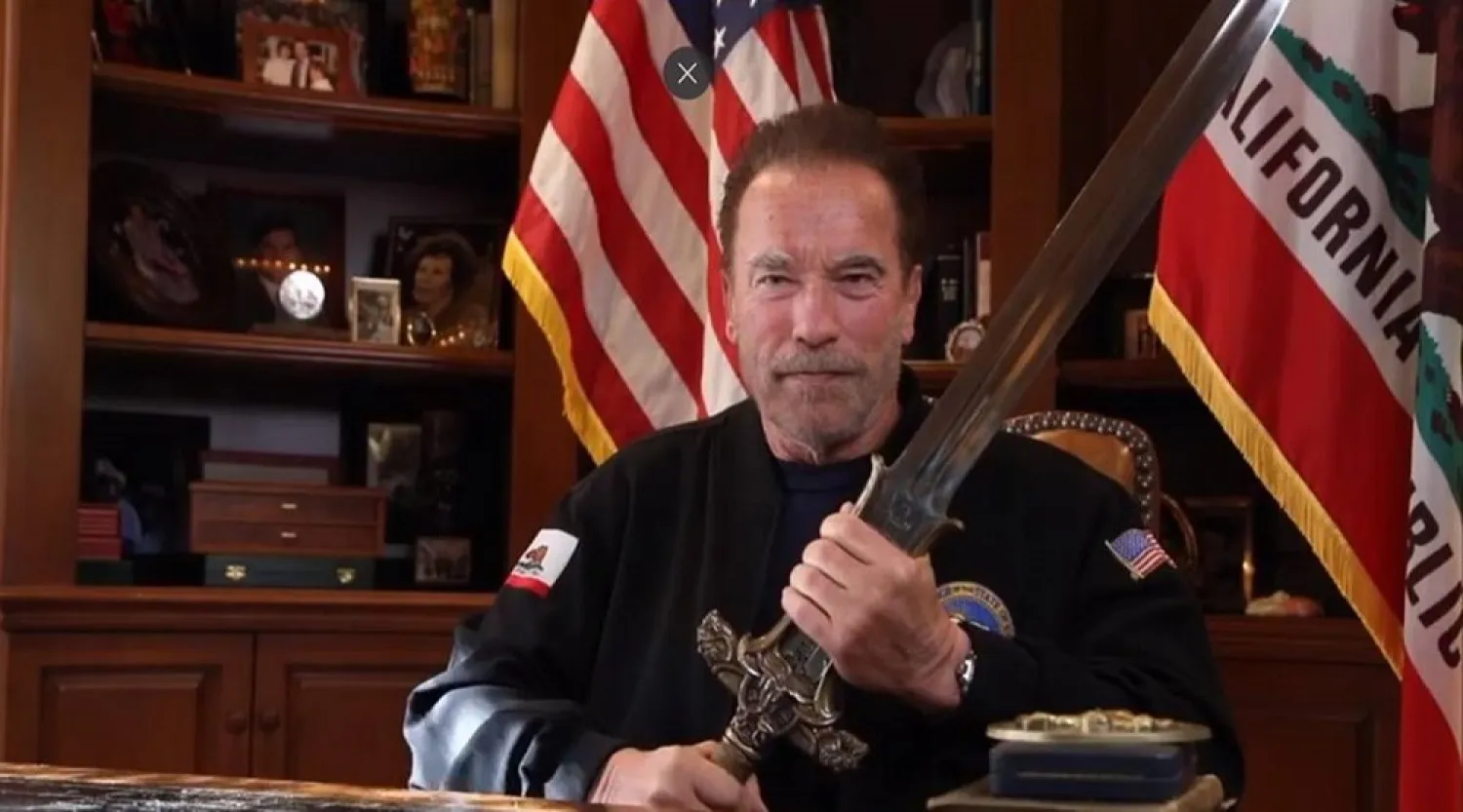 Arnold Schwarzenegger likened American democracy to the sword he brandished in his early role as Conan the Barbarian, which he said only grows stronger when it is tempered. (AP)