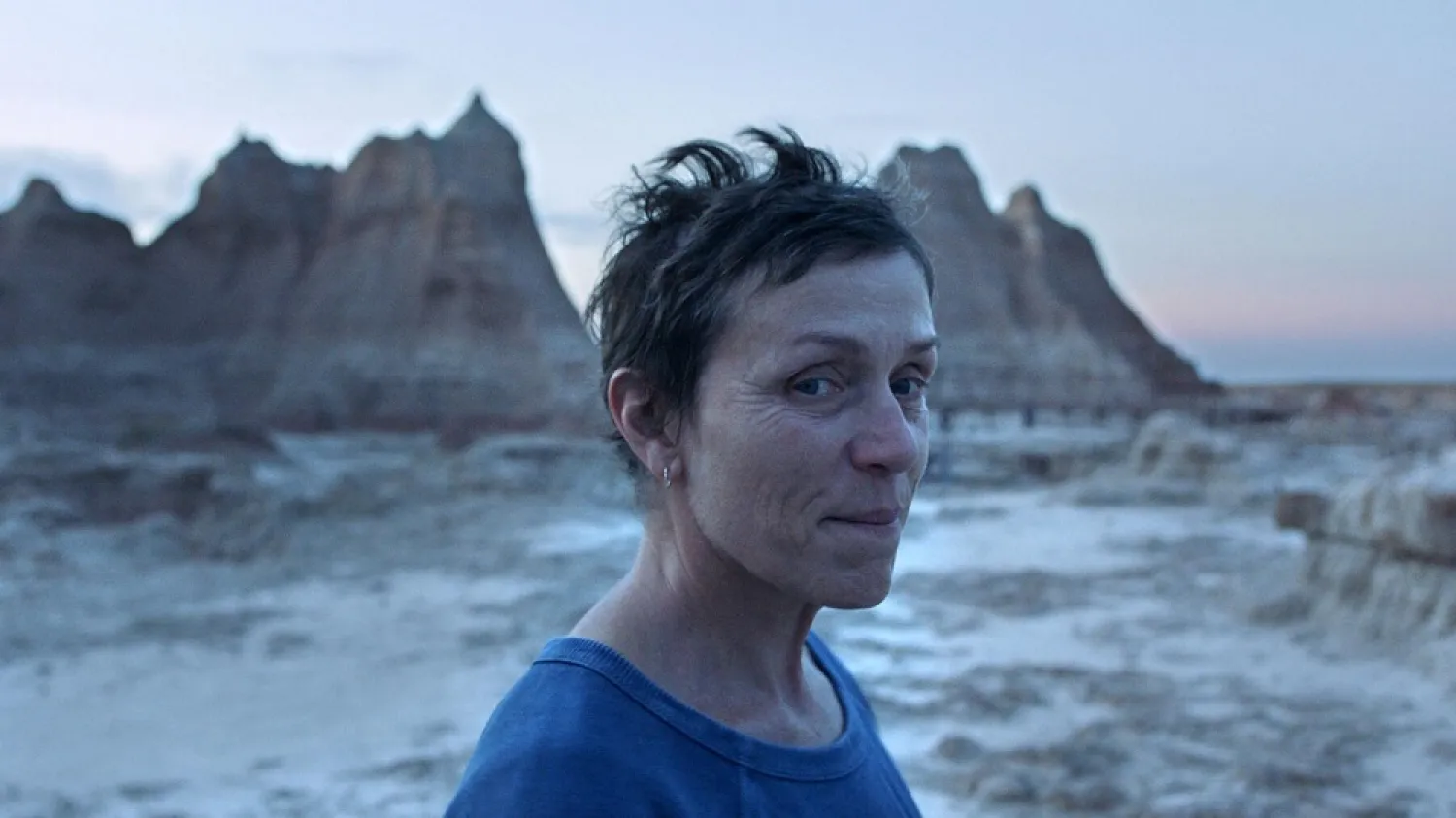 This image released by Searchlight Pictures shows Frances McDormand in a scene from the film "Nomadland" by Chloe Zhao. The film won best feature at the Gotham Awards on Monday, Jan. 11, 2021. (Searchlight Pictures via AP)
