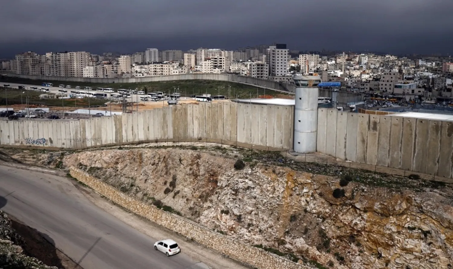 The Israeli separation barrier dividing East Jerusalem and the Palestinian West Bank town of Qalandia. (AFP)