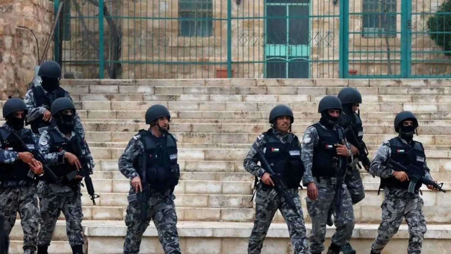 Jordanian policemen leave after ending security operations at the Crusader-era castle in Karak, where armed gunmen carried out an attack a day before, on December 19, 2016. Muhammad Hamed/Reuters
