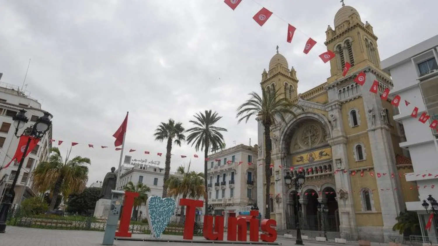 A picture taken on March 18, 2020 shows Habib Bourguiba Avenue empty shortly before a night curfew imposed to halt the spread of coronavirus, in the Tunisian capital Tunis. AFP