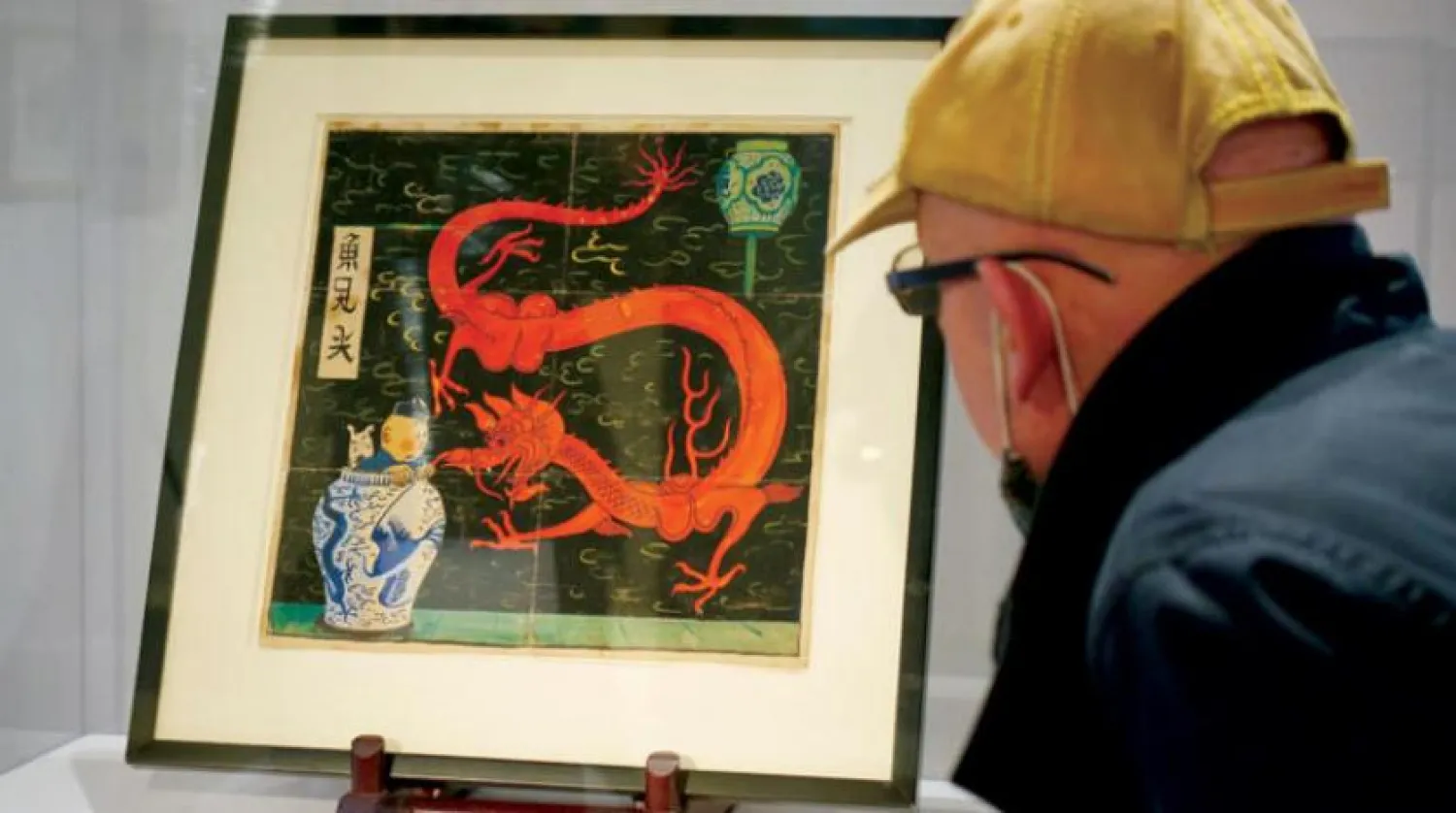 Paris’teki bir müzayedede sergilenen Tenten kitabının kapağı.