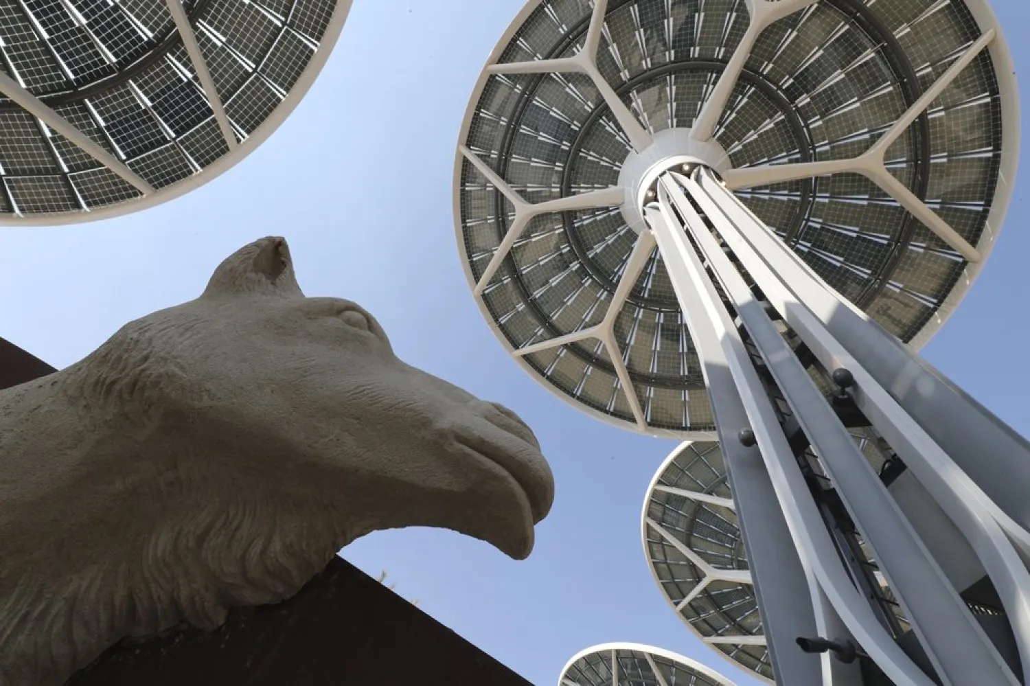 Energy trees are seen next to a camel sculpture at Terra, The Sustainability Pavilion during a media tour at the Dubai World Expo site in Dubai, UAE, Jan. 16, 2021. (AP)