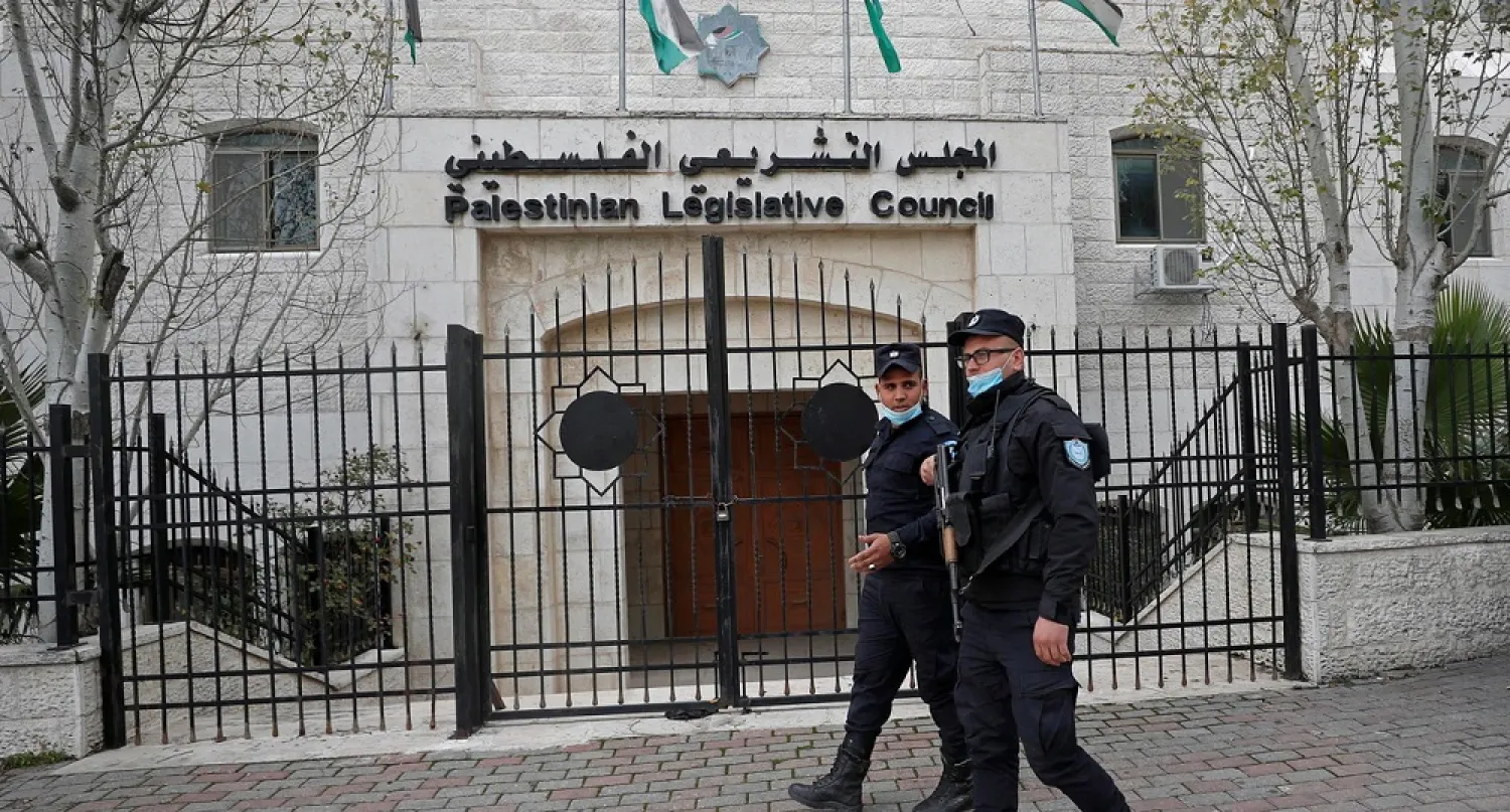 Palestinian policemen guard outside the Palestinian Legislative Council in Ramallah, in the Israeli-occupied West Bank, Jan. 16, 2021. (Reuters)