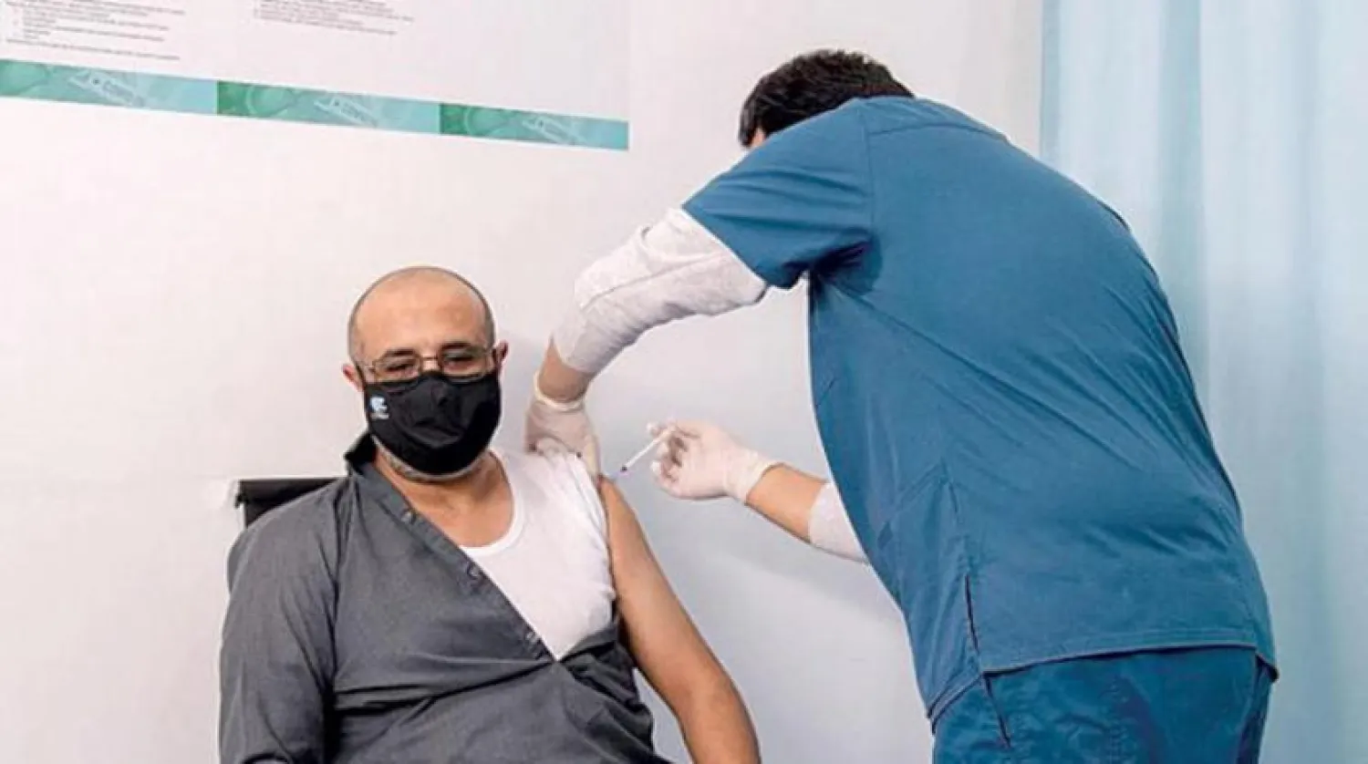 A man getting vaccinated in Saudi Arabia. SPA