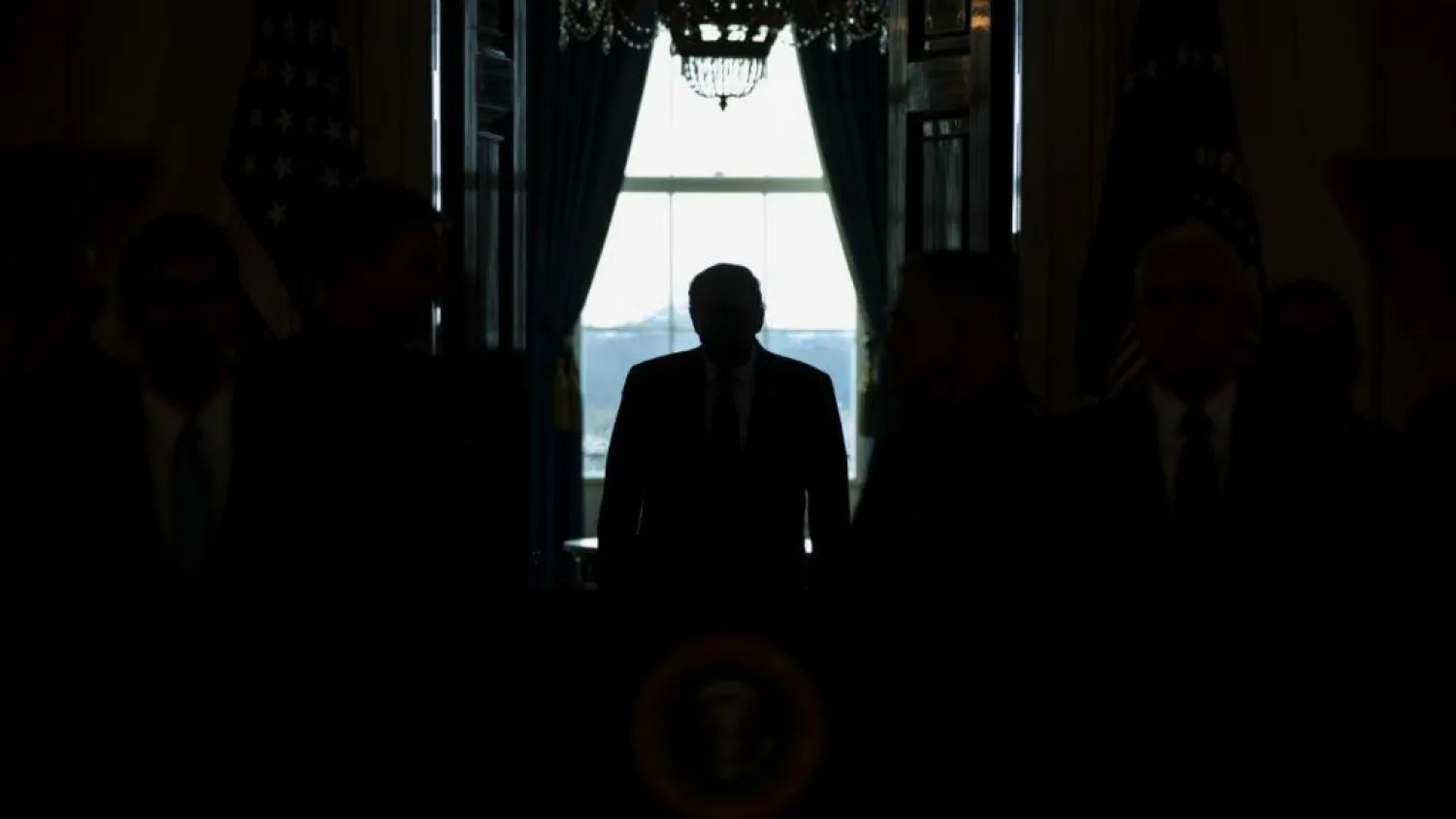 In this Jan. 8, 2020, file photo President Donald Trump arrives to address the nation from the White House on the ballistic missile strike that Iran launched against Iraqi air bases housing US. troops in Washington. (AP Photo/ Evan Vucci, File)