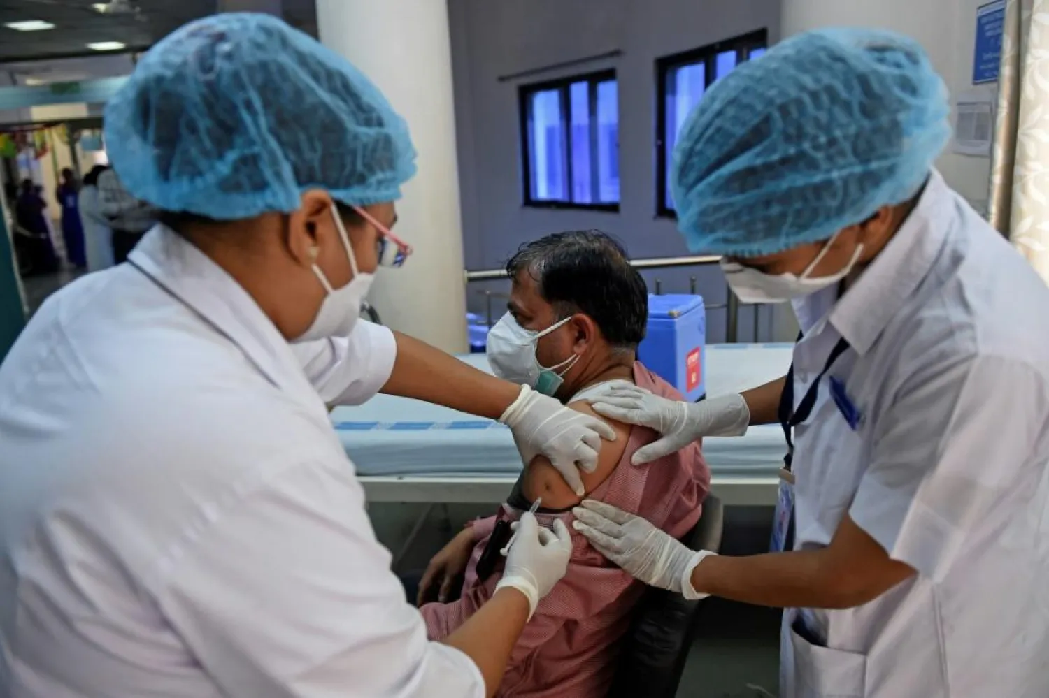 India is aiming to vaccinate 300 million people against Covid-19 by July | AFP