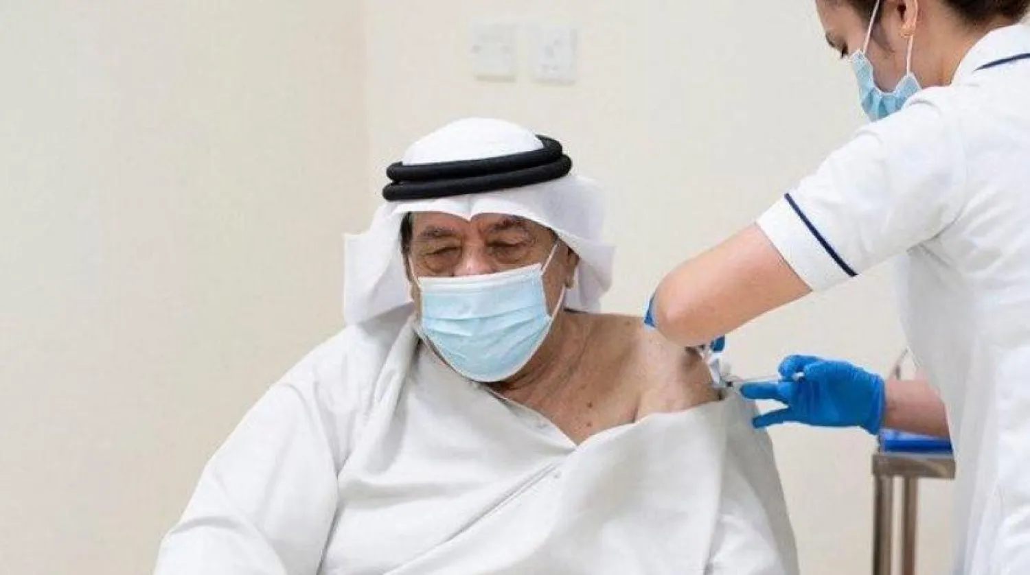 A UAE citizen receives the COVID-19 vaccination. The Government of Dubai Media Office