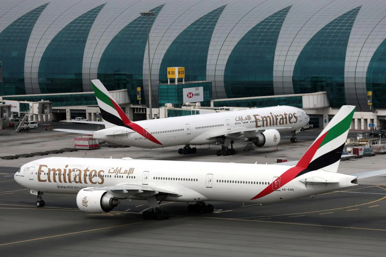 FILE PHOTO: Emirates Airline Boeing 777-300ER planes are seen at Dubai International Airport in Dubai, United Arab Emirates February 15, 2019. REUTERS/Christopher Pike