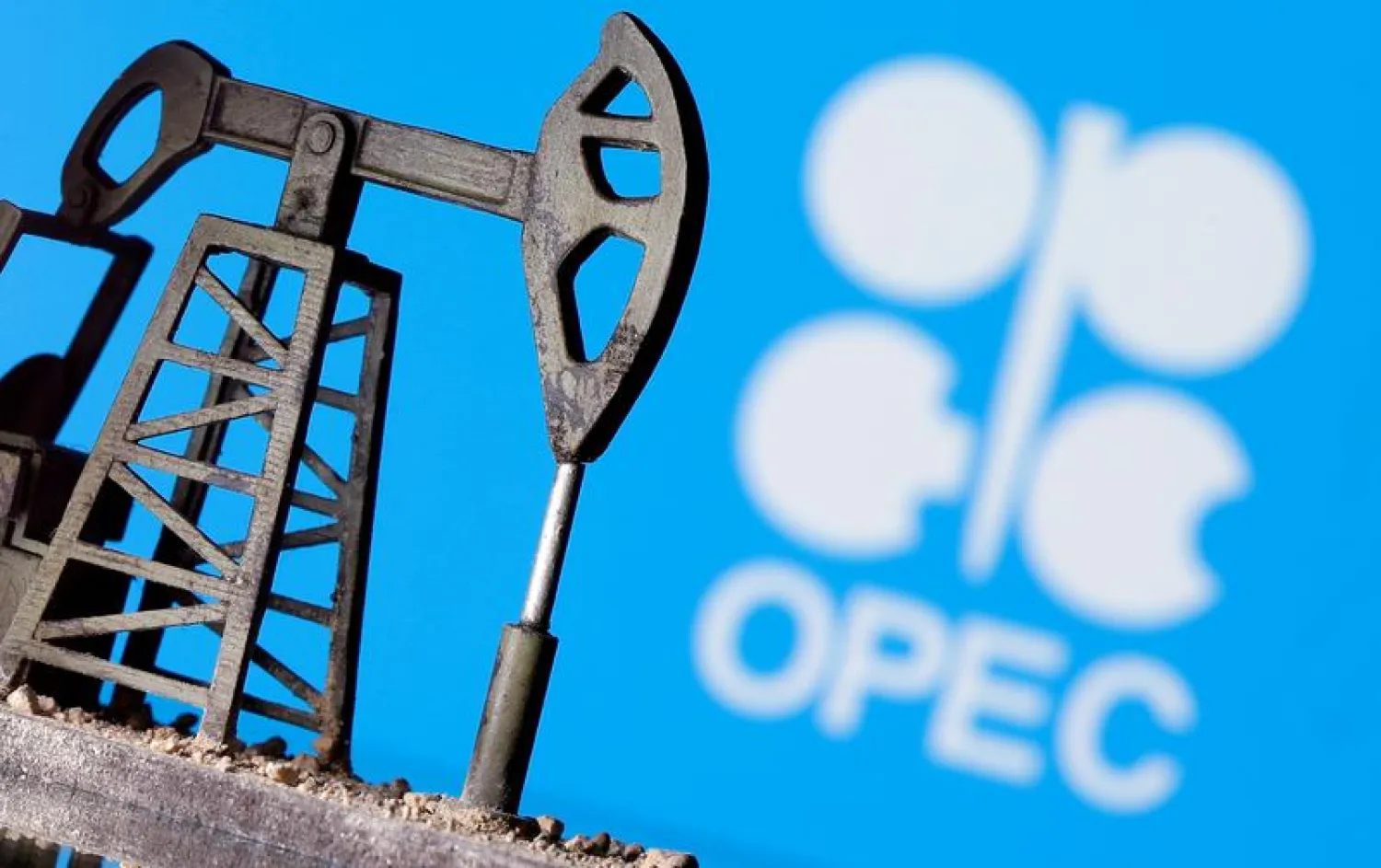 A 3D printed oil pump jack is seen in front of displayed OPEC logo in this illustration picture, April 14, 2020. REUTERS/Dado Ruvic/Illustration/File Photo/File Photo