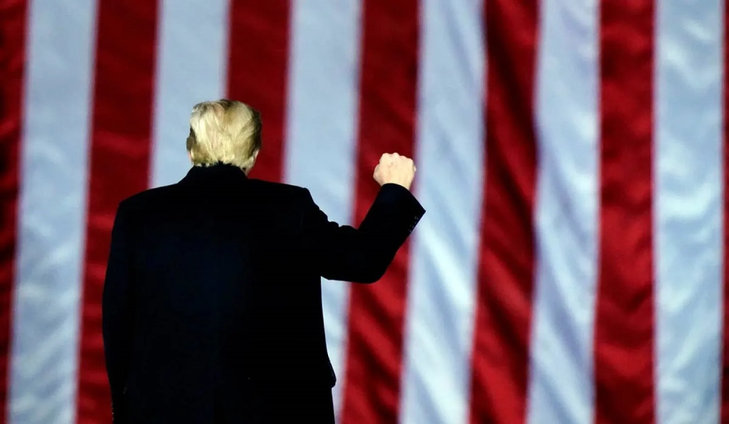 President Donald Trump gestures at a campaign rally in support of US Senate Republican candidates Sen. Kelly Loeffler and David Perdue in Dalton, Ga. January 4, 2021. (AP)