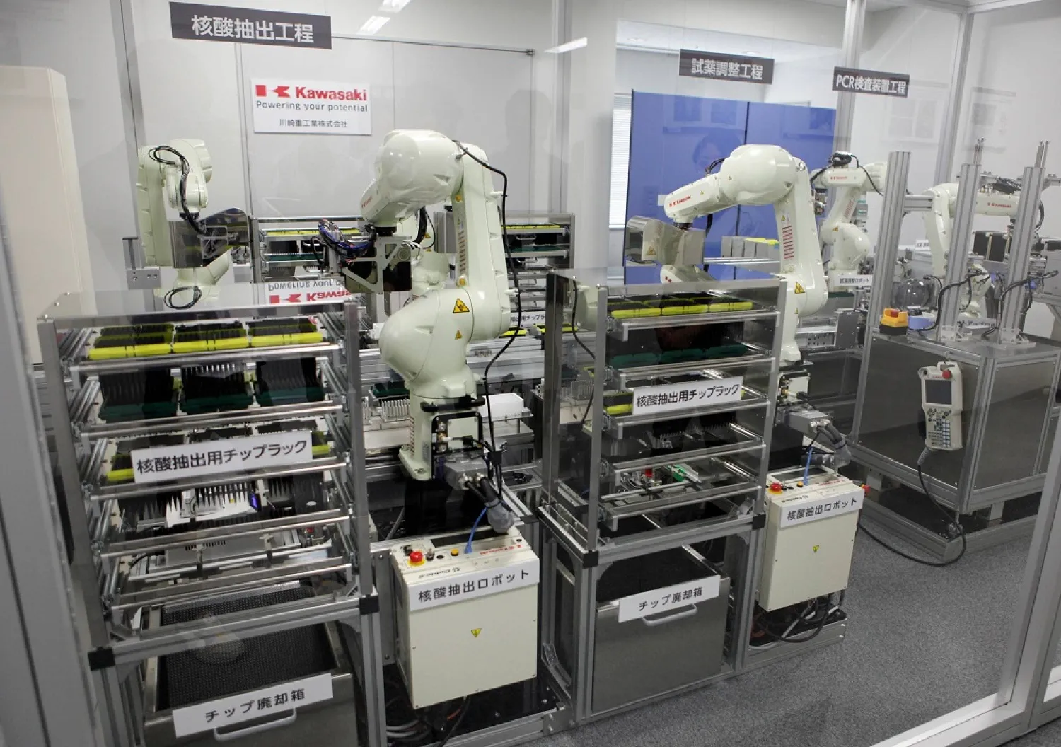 The automated COVID-19 testing machine uses a robotic arm to take a sample from a person’s nose and can deliver the results in about 80 minutes. (Reuters)