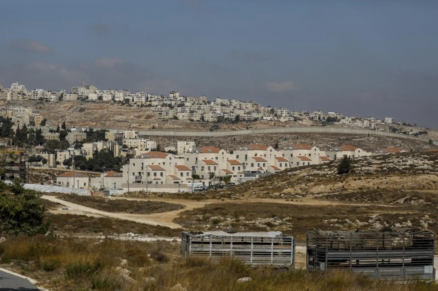 The Israeli settlement of Neve Yaakov (foreground) in the occupied West Bank. (AFP)

