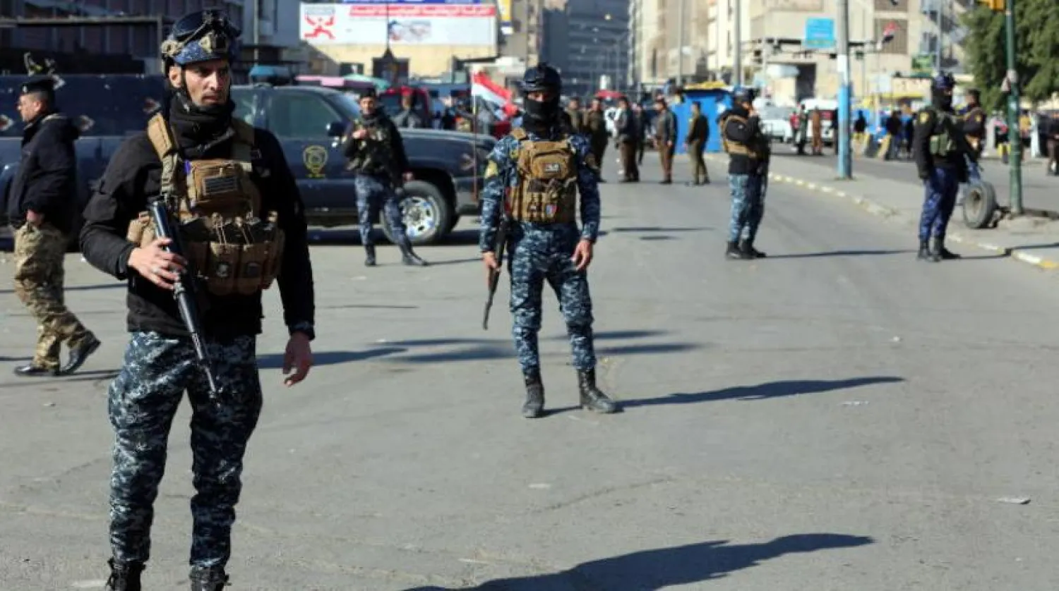 Security at the site of the suicide bombings in a central Baghdad used clothes market, Iraq, 21 January 2021. EPA/AHMED JALIL