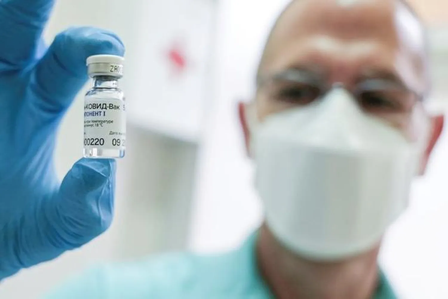 A medical worker holds a vial of the Russian Sputnik V coronavirus vaccine in Belgrade, Serbia, January 6, 2021. REUTERS/Fedja Grulovic/File Photo