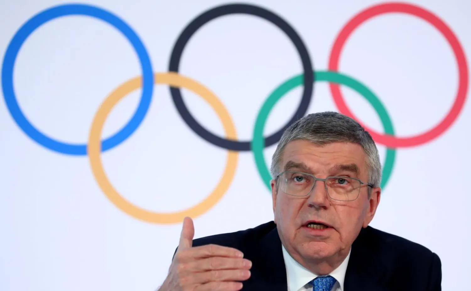 FILE PHOTO: Thomas Bach, President of the International Olympic Committee (IOC) attends a news conference after an Executive Board meeting in Lausanne, Switzerland, March 4, 2020. REUTERS/Denis Balibouse/File Photo